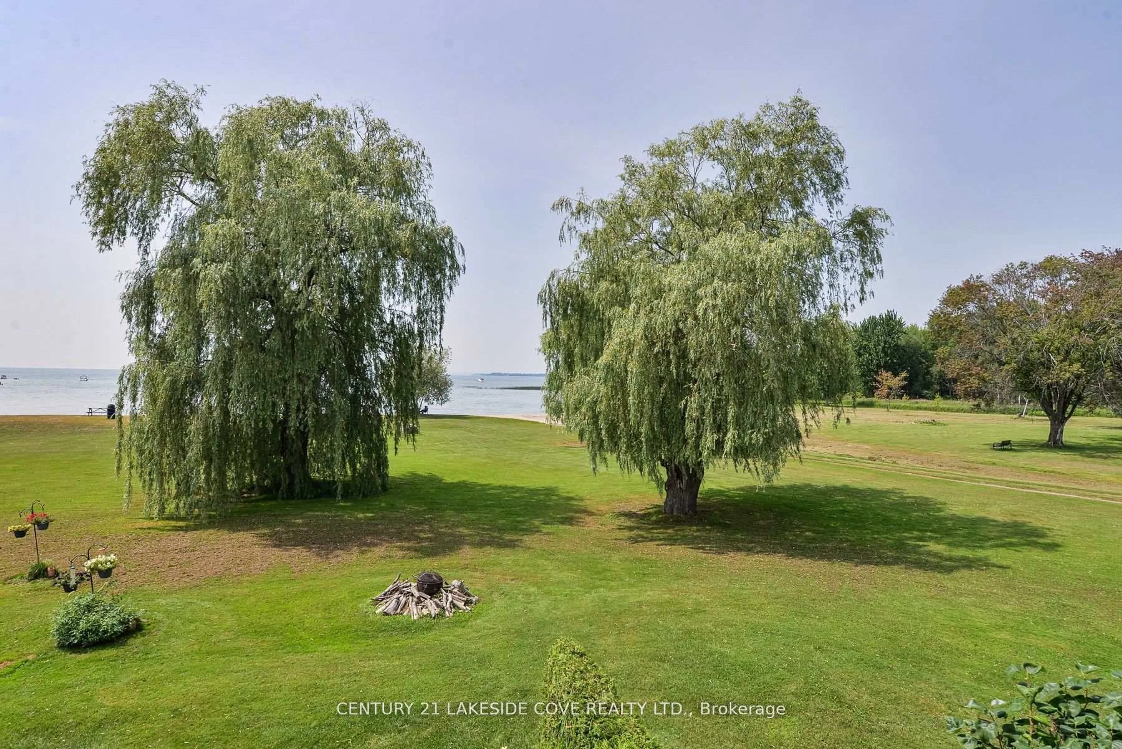 A pic from outside/outdoor area/front of a property/back of a property/a pic from drone, water/lake/river/ocean view for 4 Paradise Blvd #19, Ramara Ontario L0K 1B0