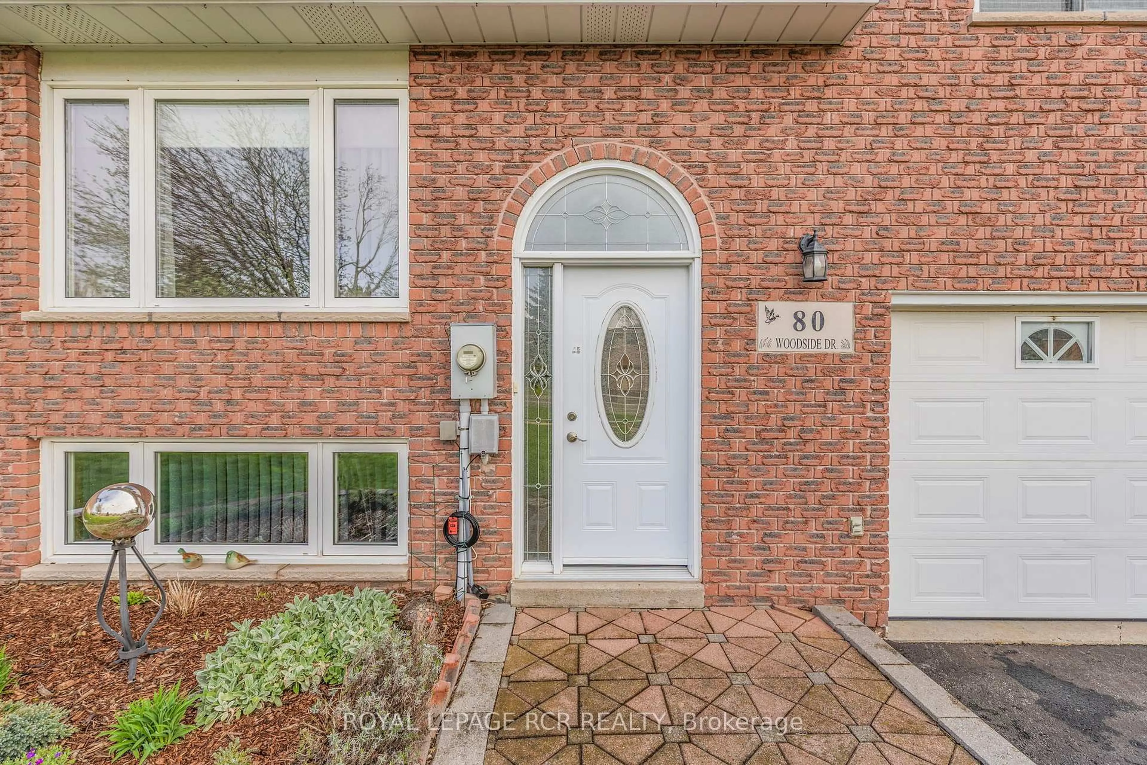 Home with brick exterior material, street for 80 Woodside Dr, Orillia Ontario L3V 7N9