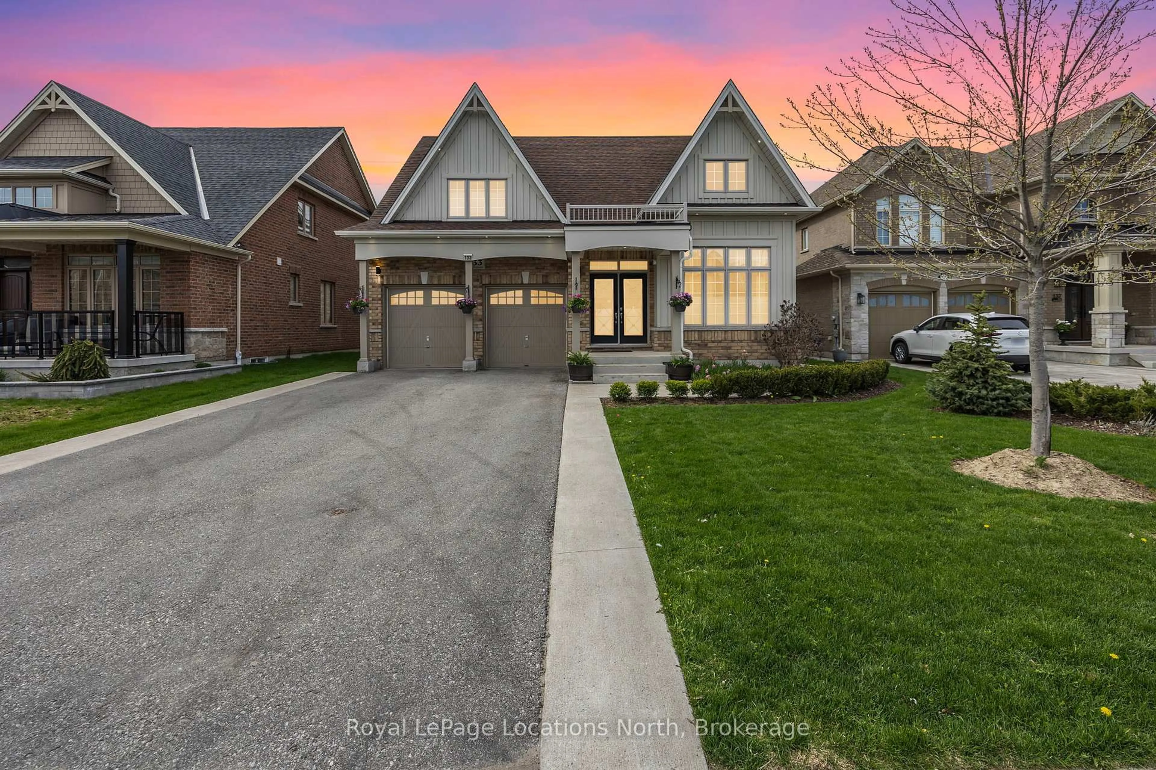 Home with brick exterior material, street for 133 Trail Blvd, Springwater Ontario L9X 0S7