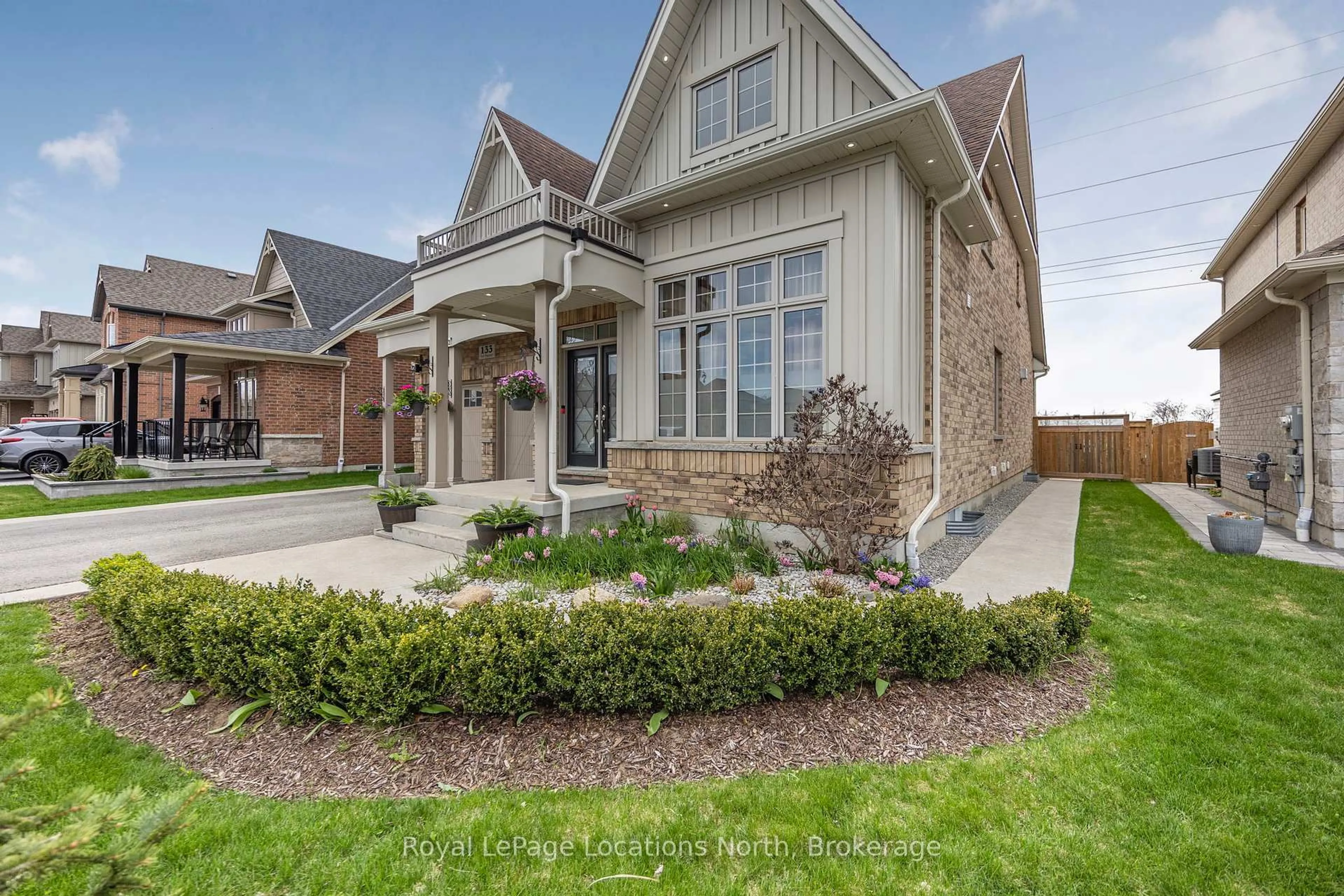 Home with brick exterior material, street for 133 Trail Blvd, Springwater Ontario L9X 0S7