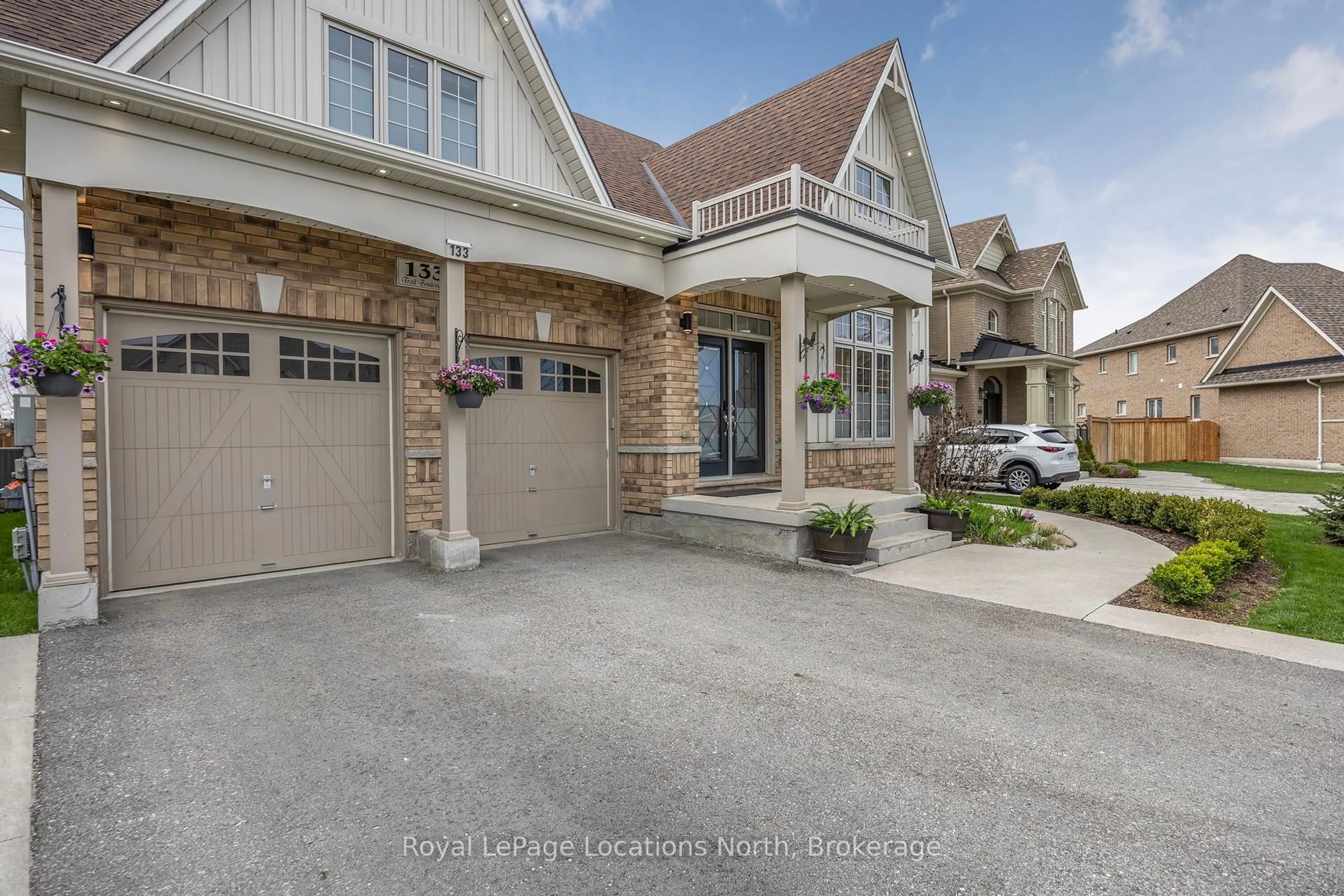 Home with brick exterior material, street for 133 Trail Blvd, Springwater Ontario L9X 0S7