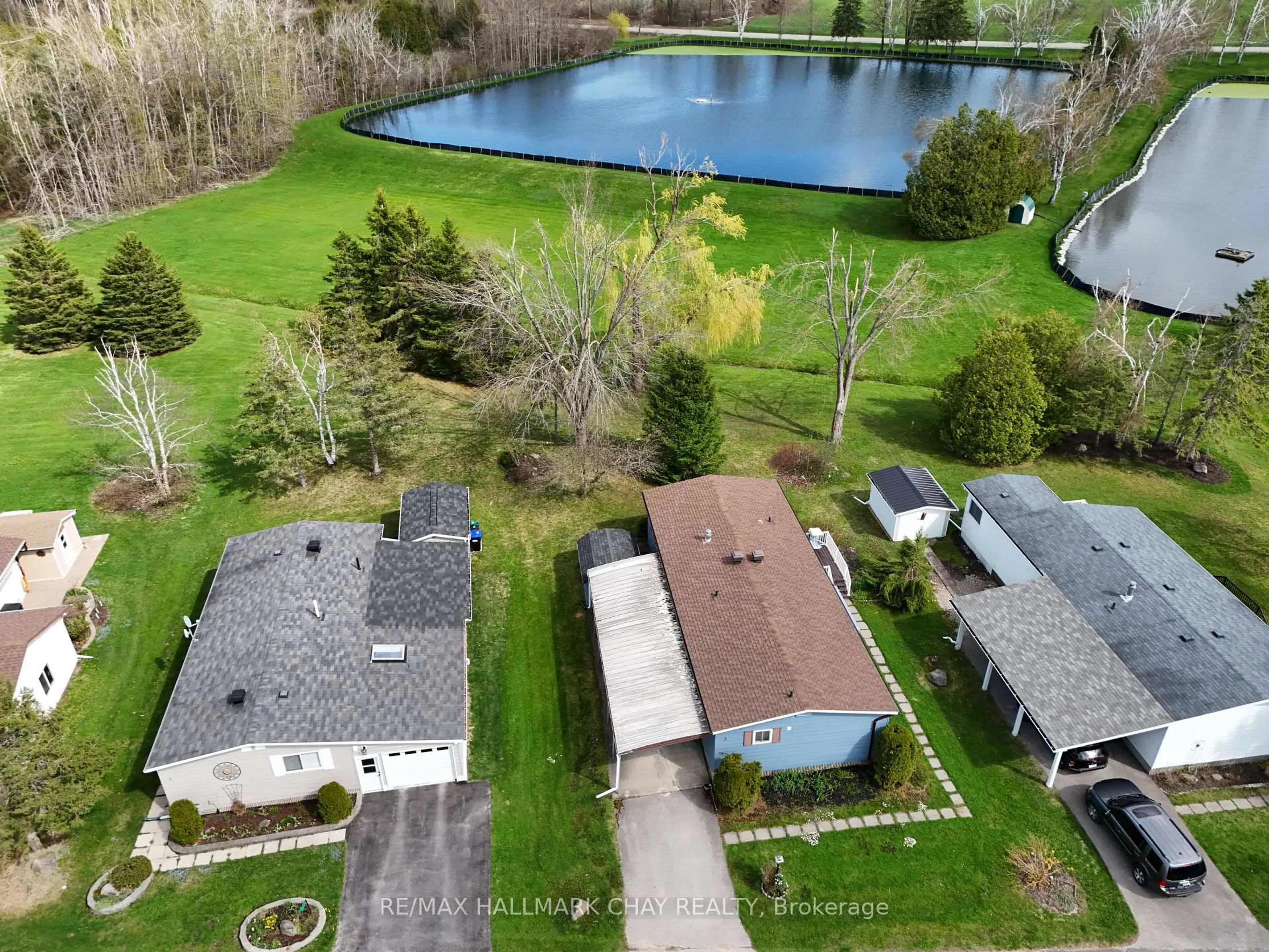 A pic from outside/outdoor area/front of a property/back of a property/a pic from drone, water/lake/river/ocean view for 3 Tamarack Dr, Oro-Medonte Ontario L0L 1T0