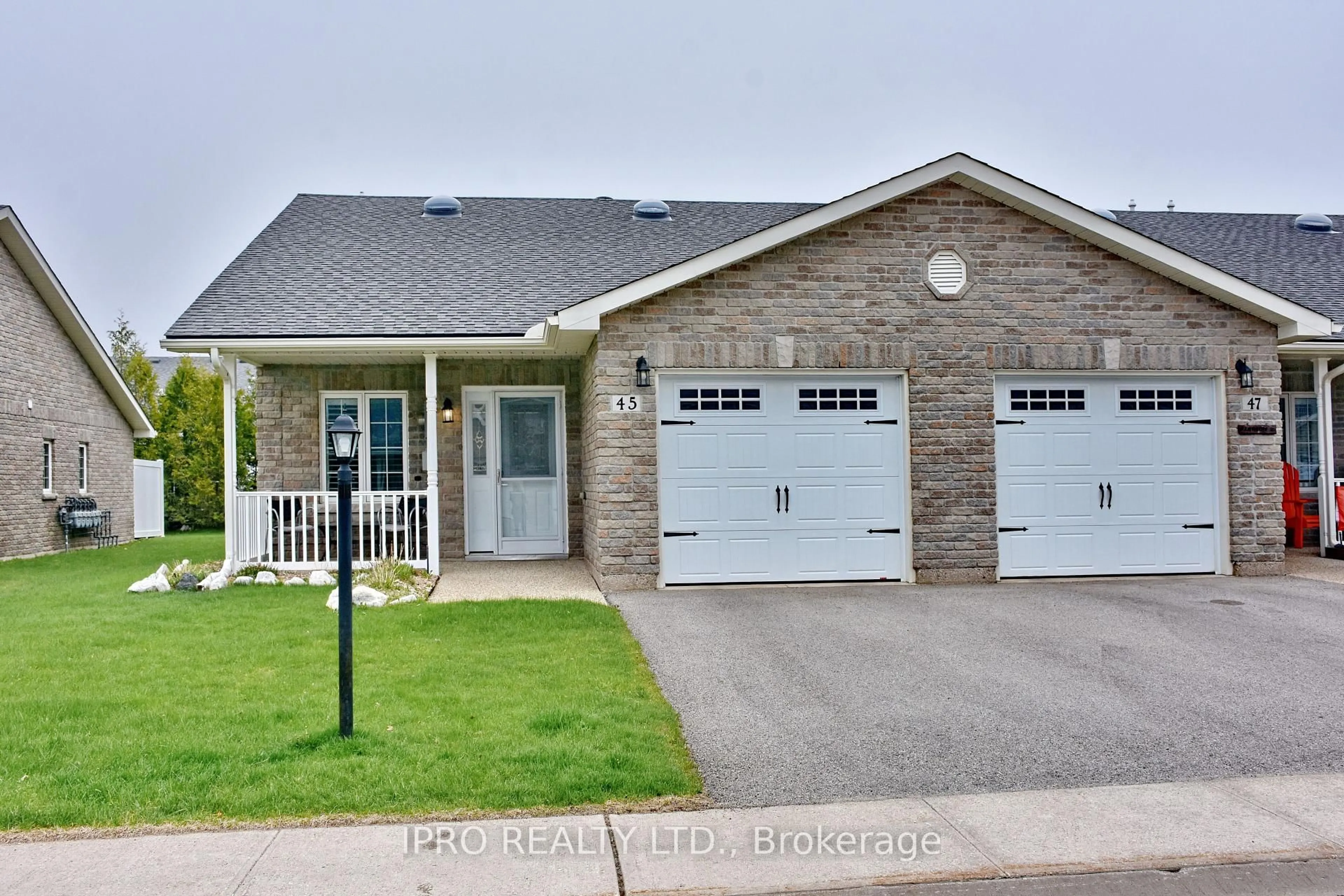 Home with brick exterior material, street for 45 Clover Cres, Wasaga Beach Ontario L9Z 0G4