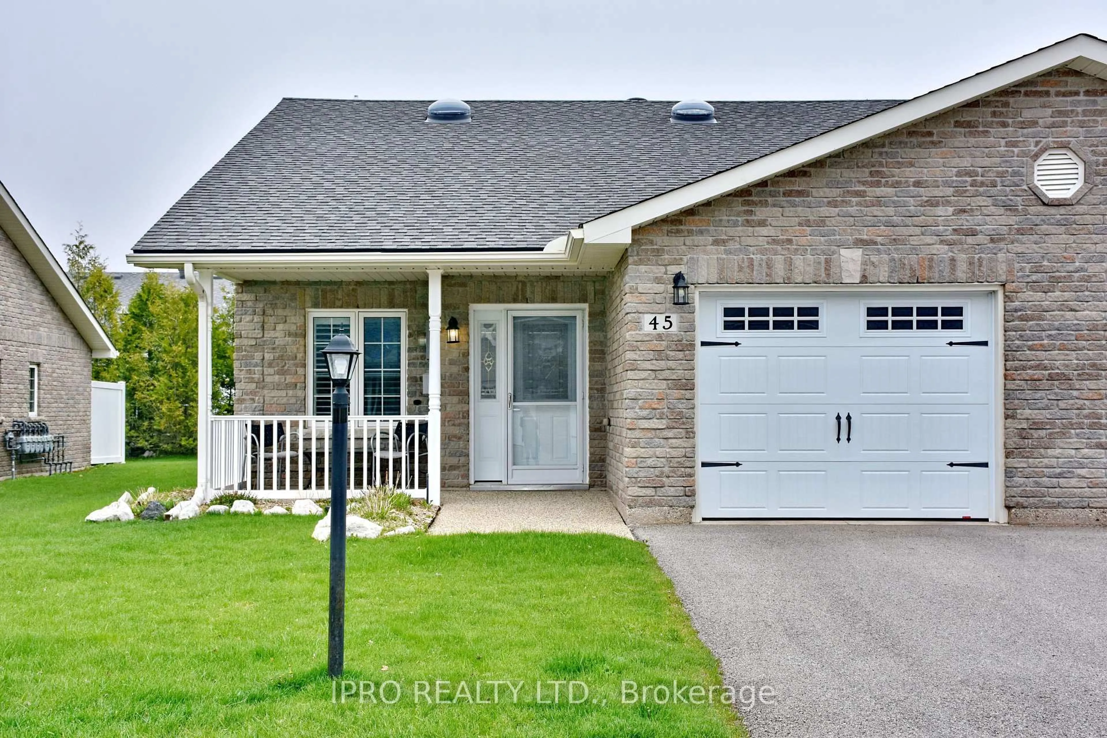 Home with brick exterior material, street for 45 Clover Cres, Wasaga Beach Ontario L9Z 0G4