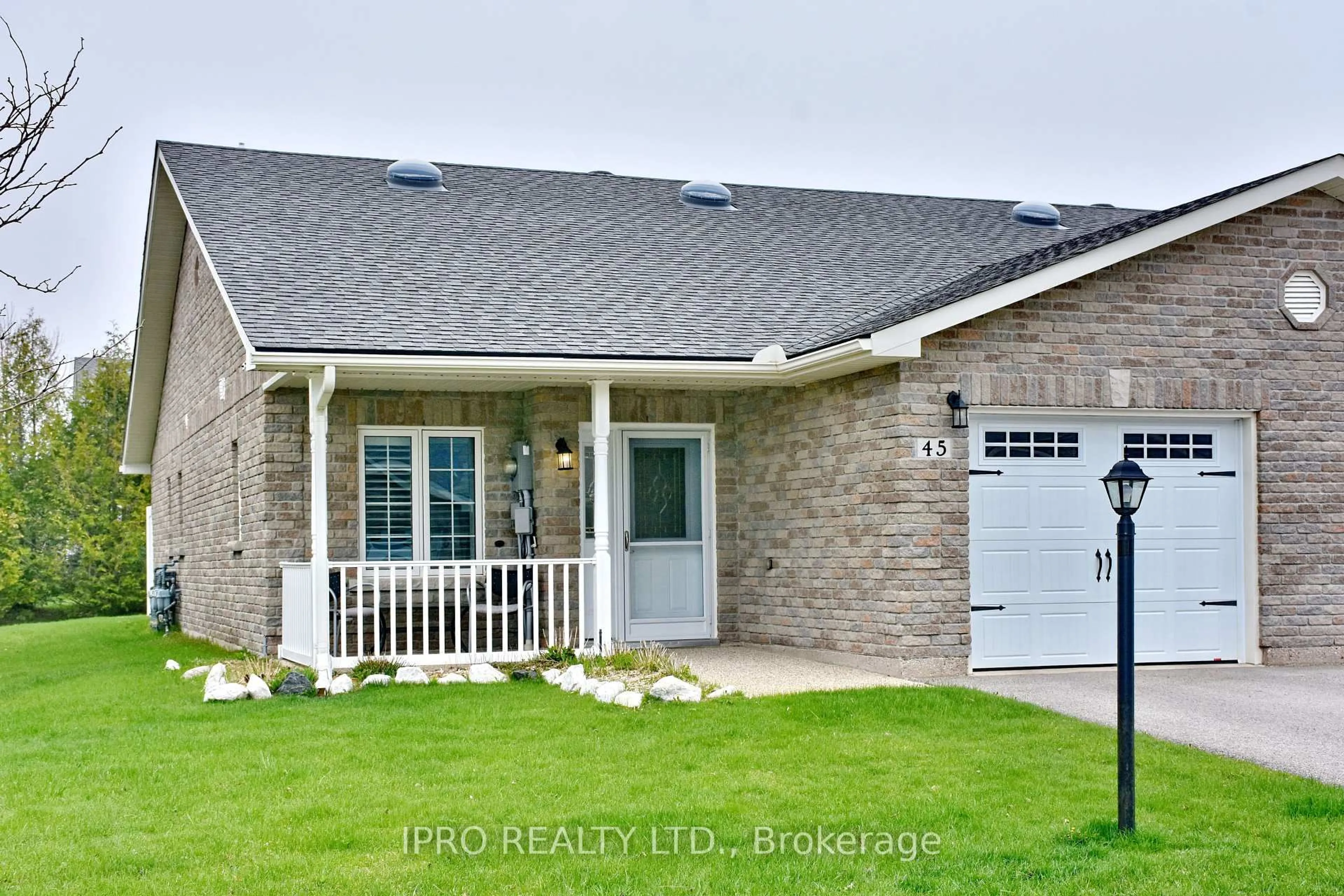 Home with brick exterior material, street for 45 Clover Cres, Wasaga Beach Ontario L9Z 0G4