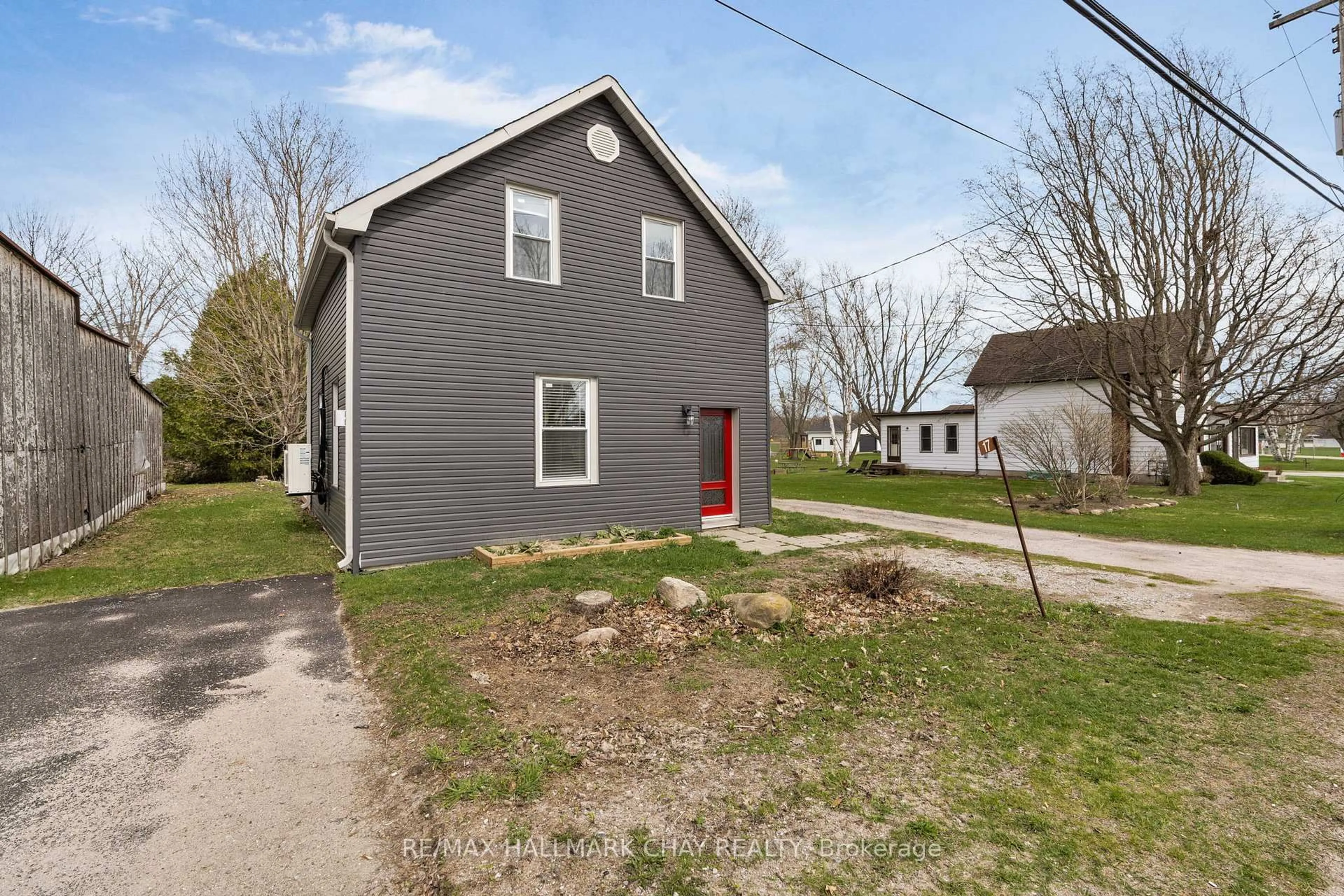 A pic from outside/outdoor area/front of a property/back of a property/a pic from drone, street for 17 County Road 6 Rd, Tiny Ontario L0L 2J0