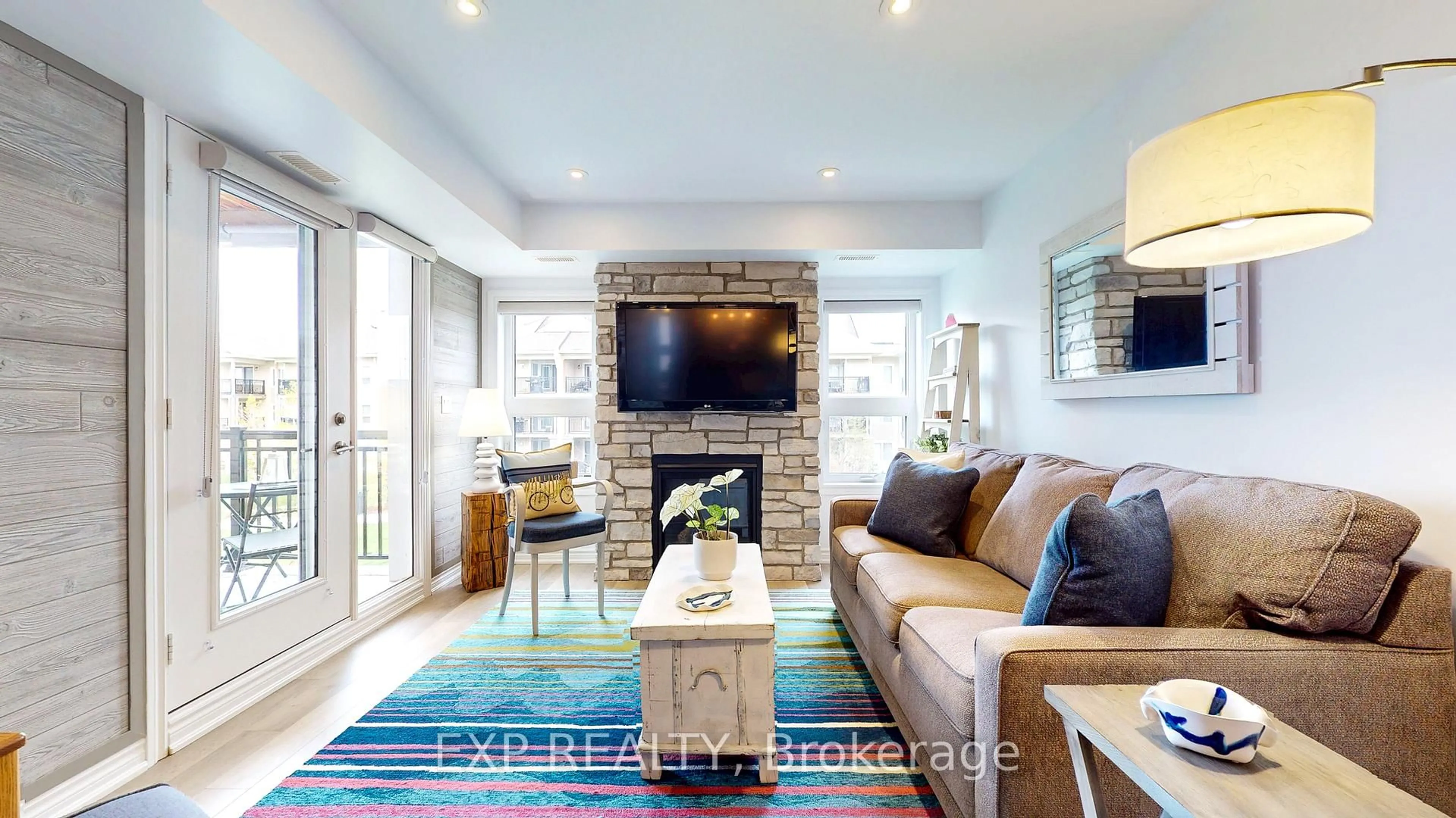 Living room with furniture, ceramic/tile floor for 5 Anchorage Cres #202, Collingwood Ontario L9Y 0Y6