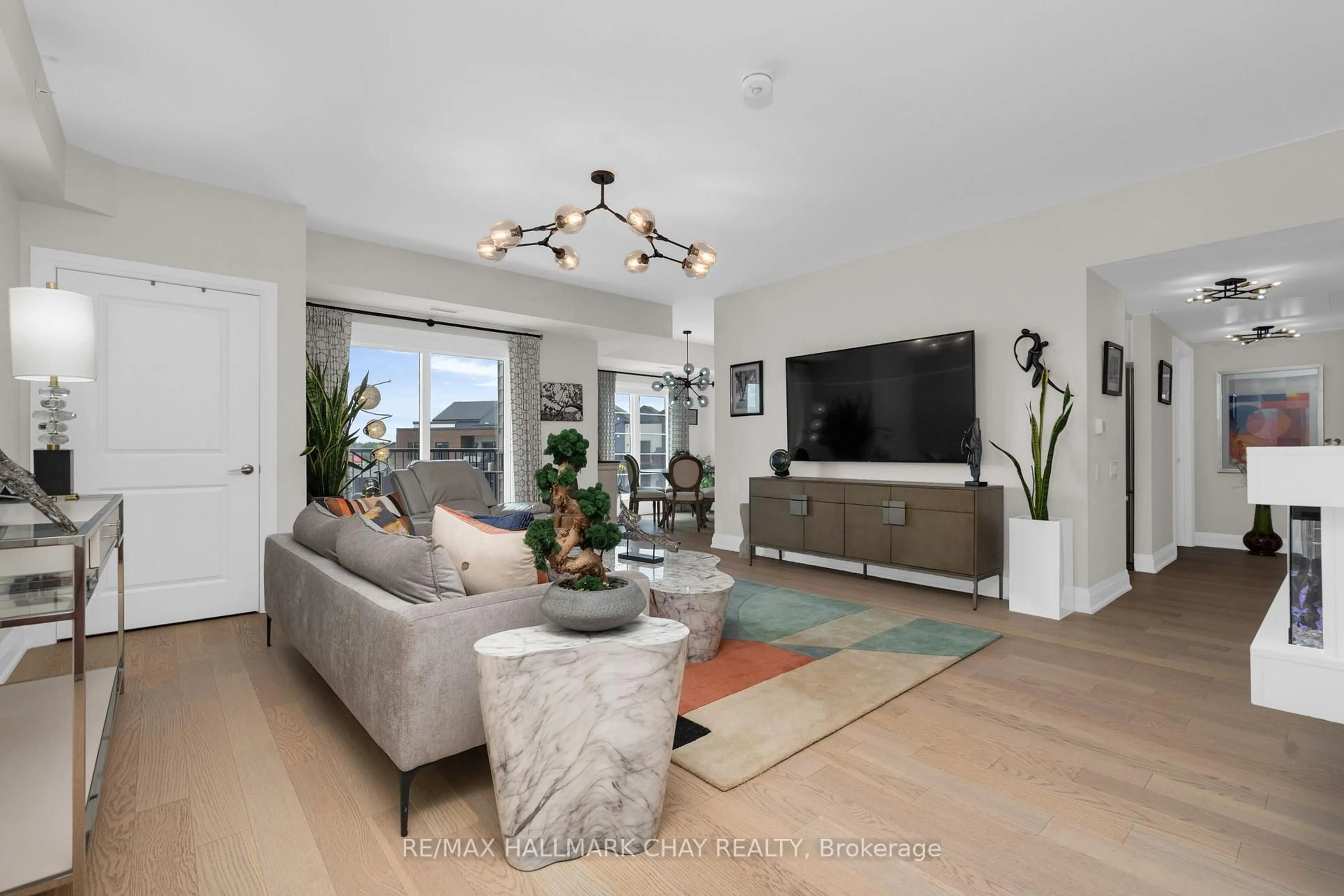 Living room with furniture, unknown for 54 Koda St #401, Barrie Ontario L9J 0J6