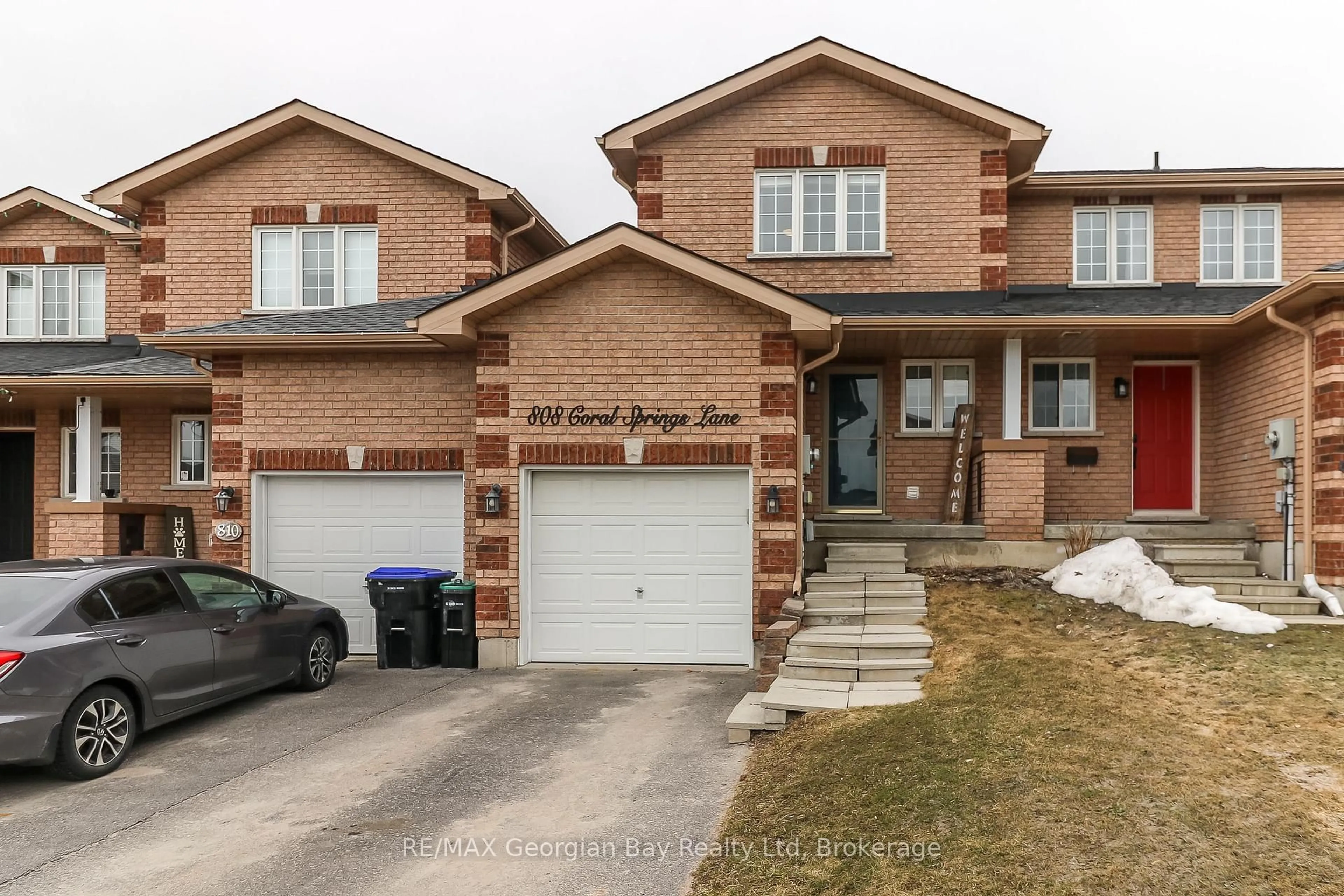 Home with brick exterior material, street for 808 Coral Springs Lane, Midland Ontario L4R 0A1