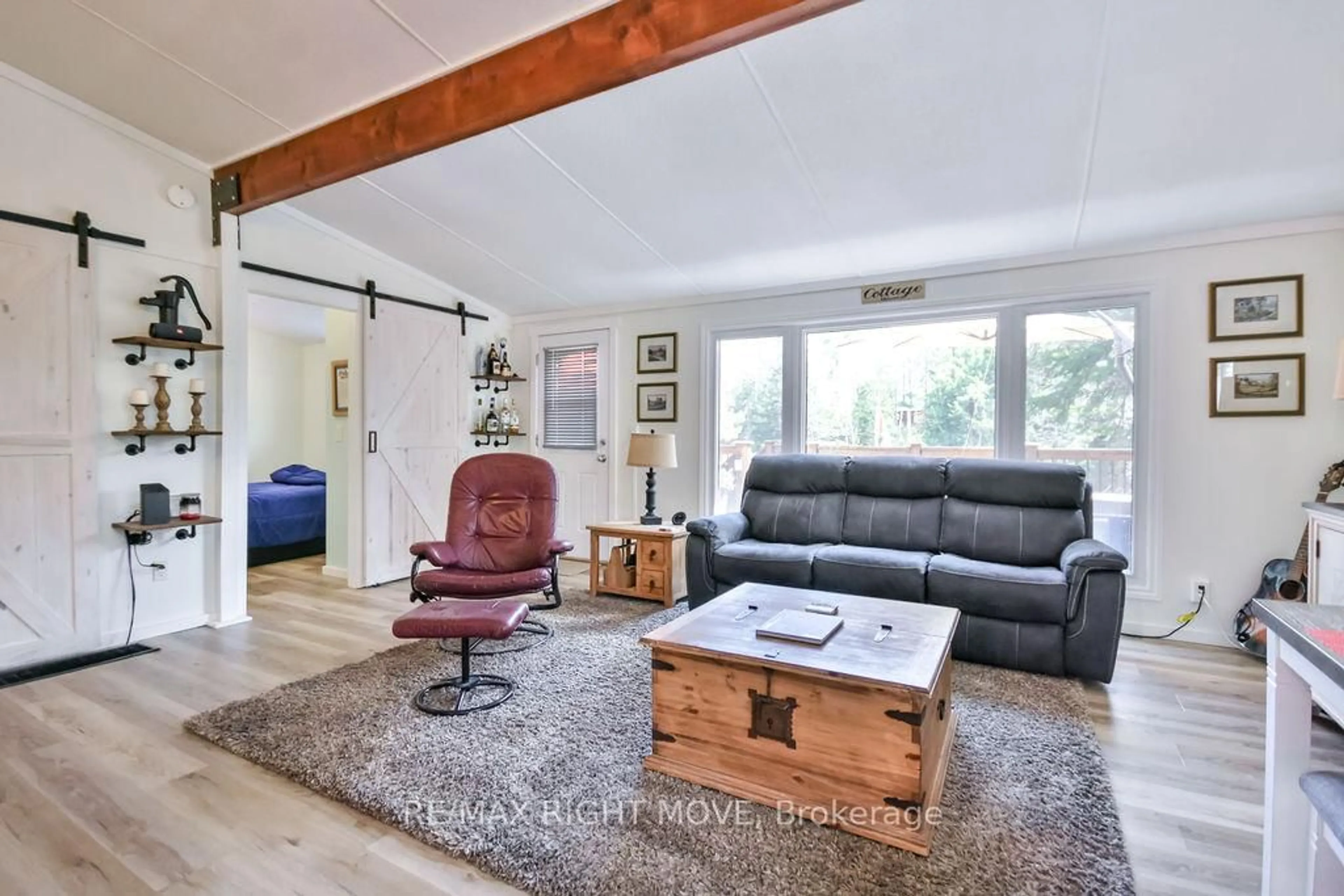 Living room with furniture, unknown for 7697 West River Rd, Ramara Ontario L0K 2B0