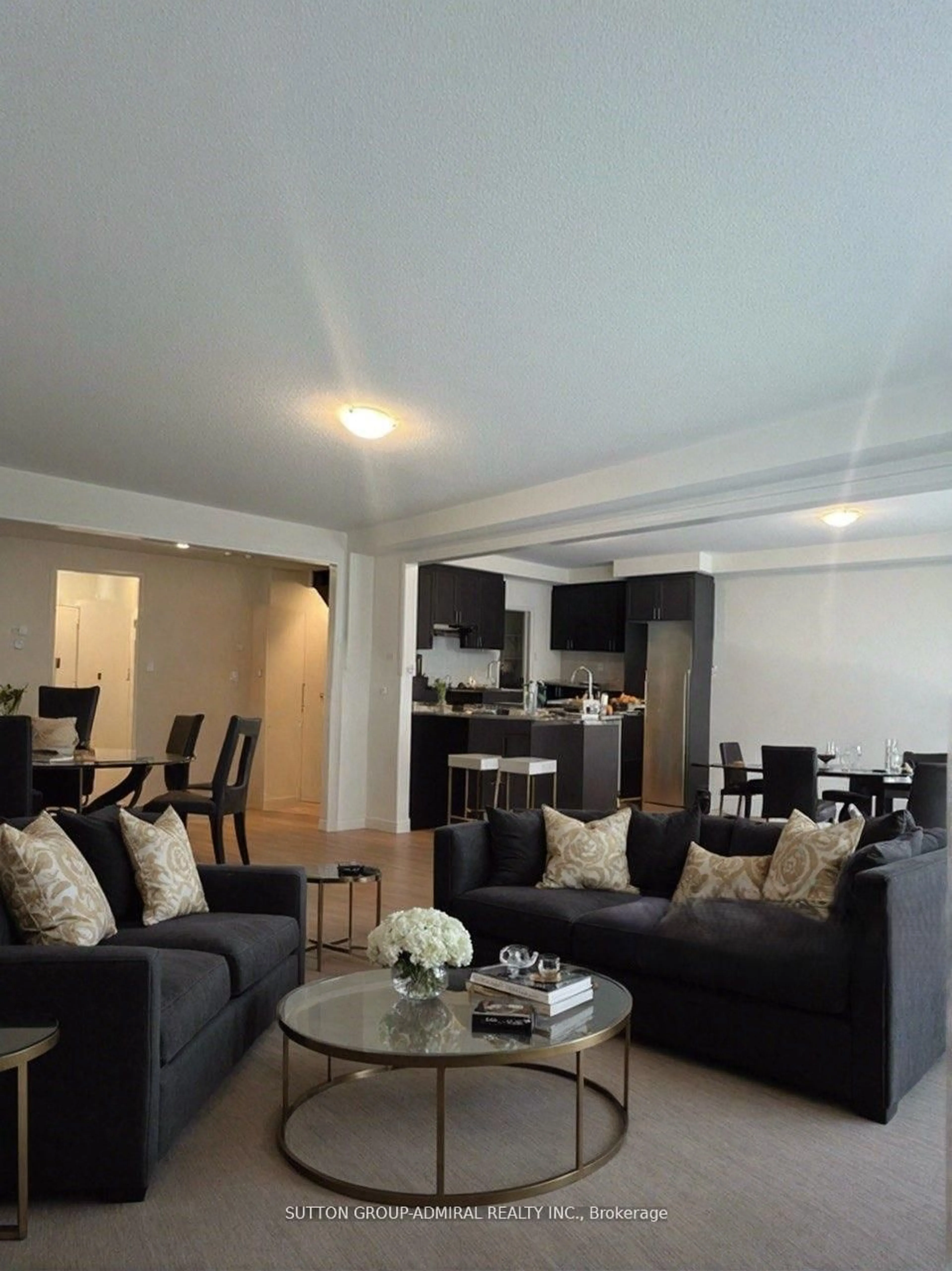 Living room with furniture, wood/laminate floor for 53 Shepherd Dr, Barrie Ontario L9J 0K4