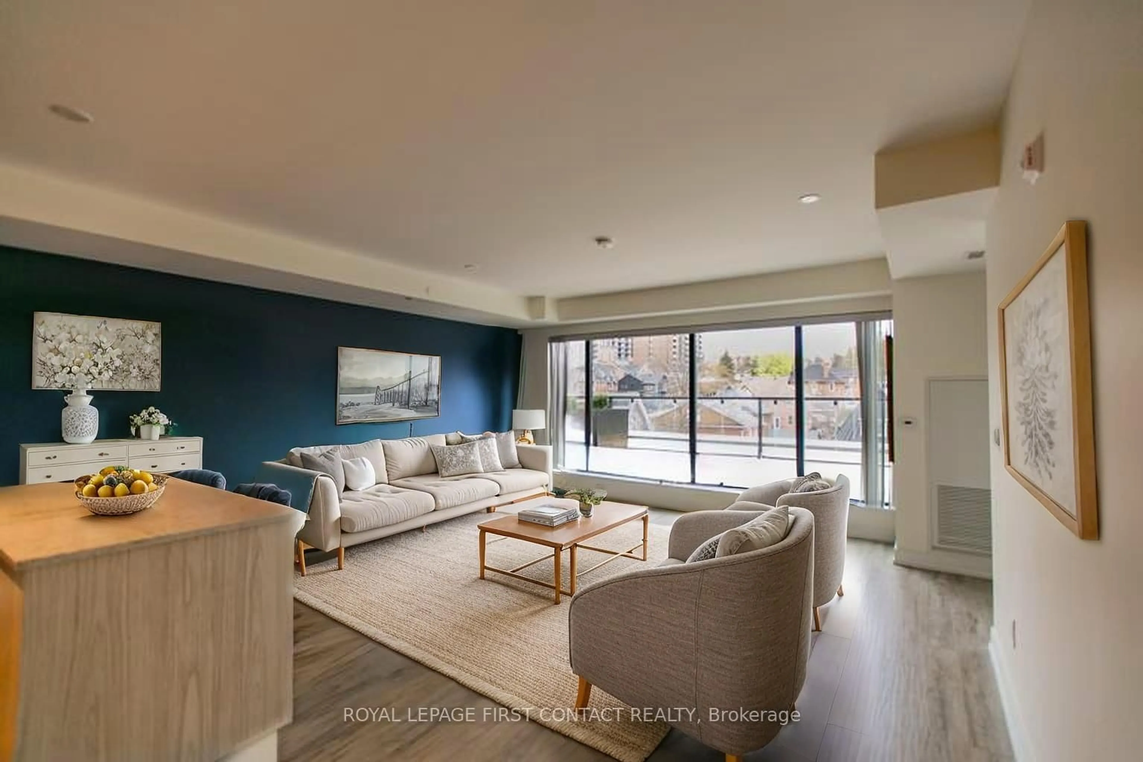 Living room with furniture, unknown for 185 Dunlop St #421, Barrie Ontario L4M 1B2