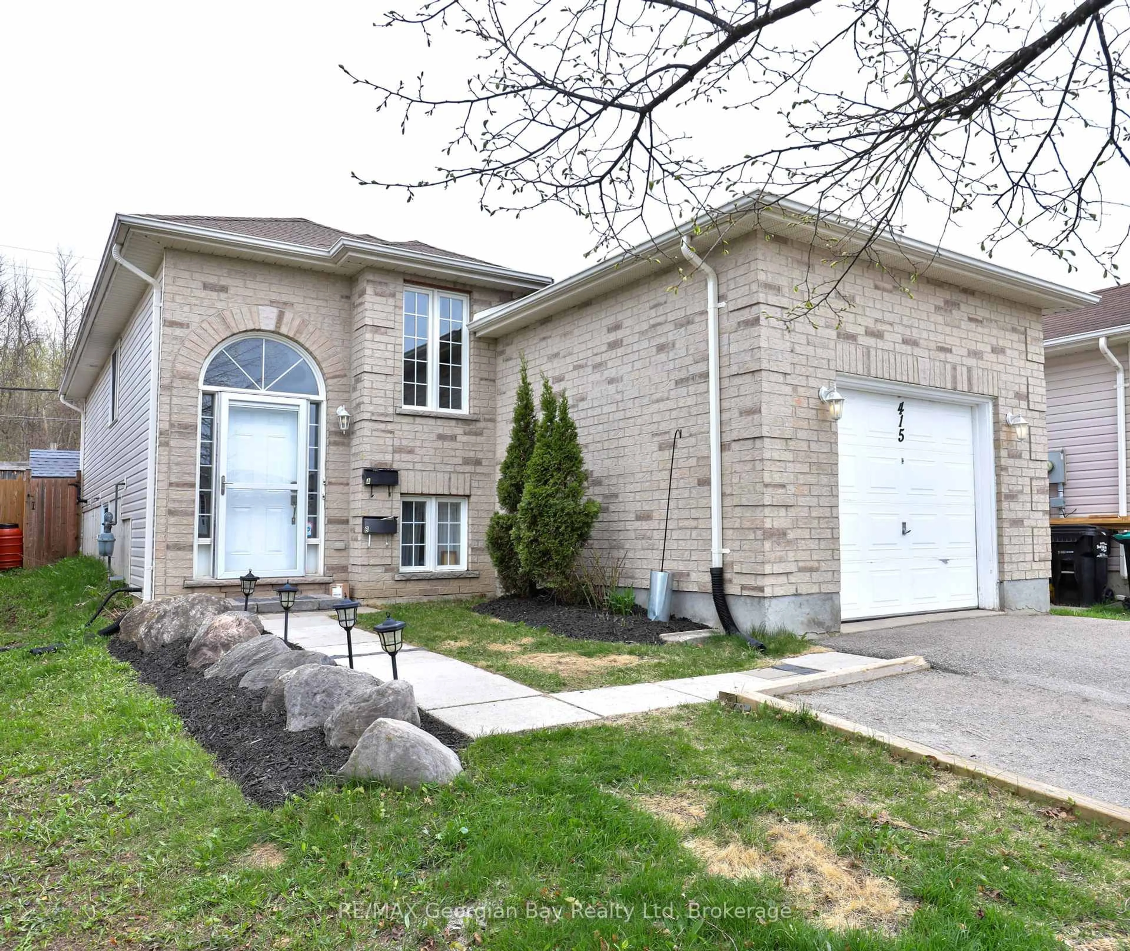 Home with brick exterior material, street for 415 Irwin St, Midland Ontario L4R 2V6