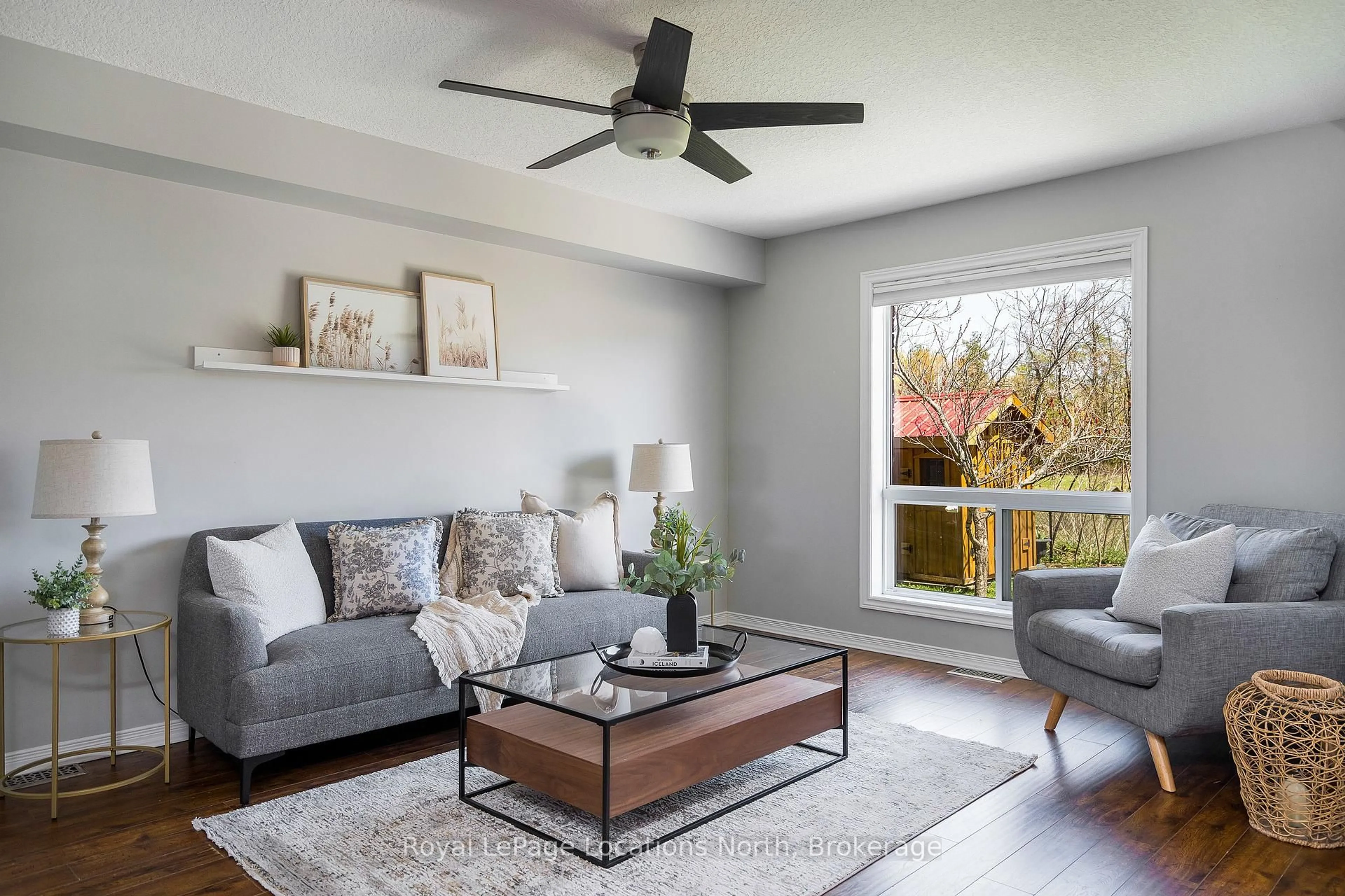 Living room with furniture, wood/laminate floor for 449 Peel St, Collingwood Ontario L9Y 0C1
