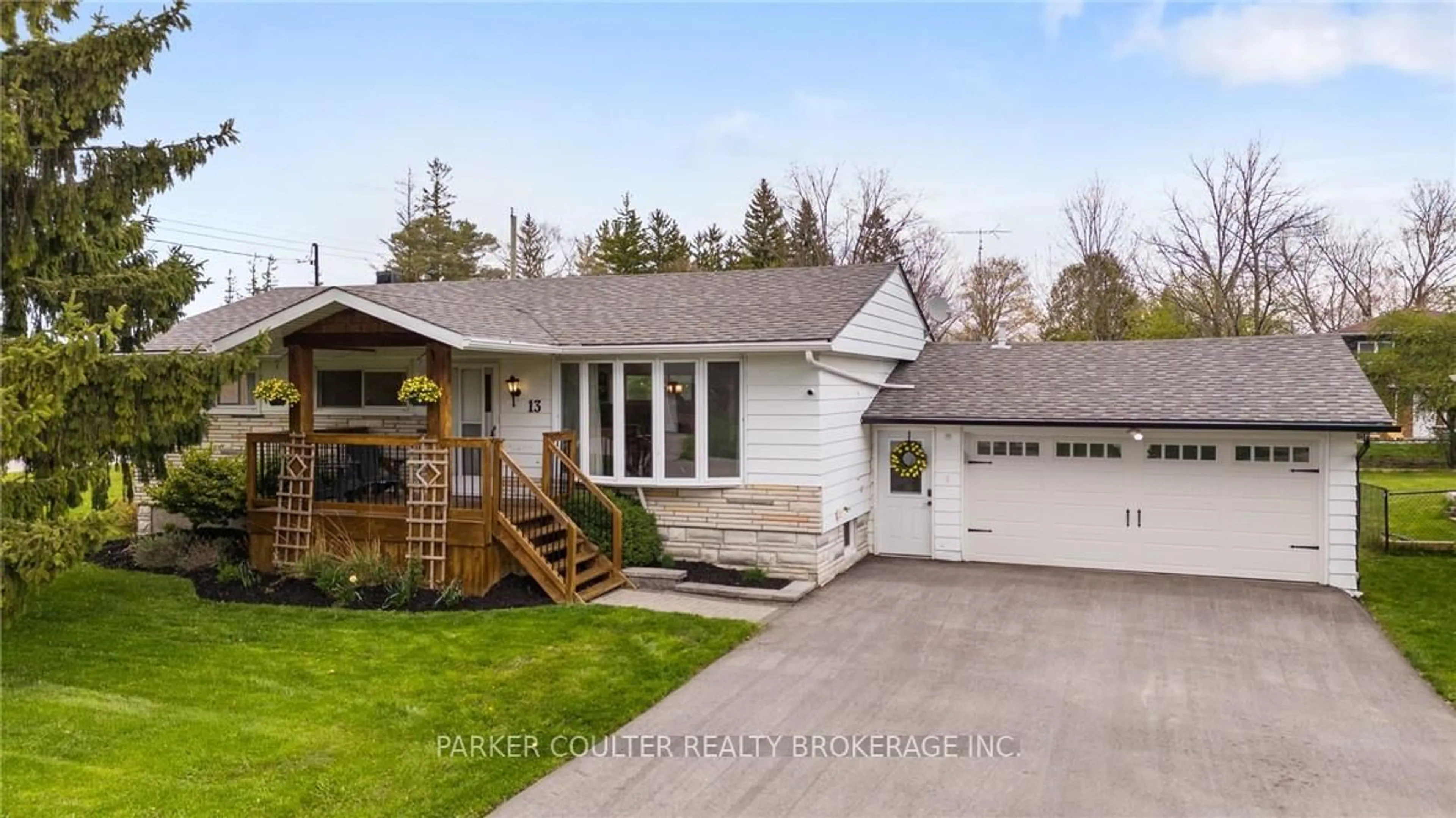 Home with vinyl exterior material, street for 13 Huron St, Springwater Ontario L0L 1Y0