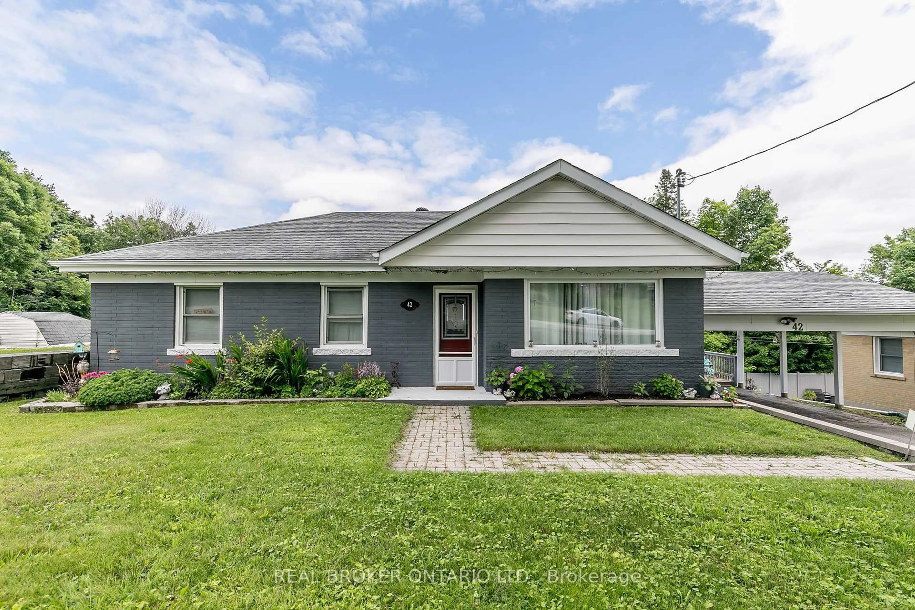 Home with vinyl exterior material, street for 42 Charles Rd, Orillia Ontario L3V 3H4