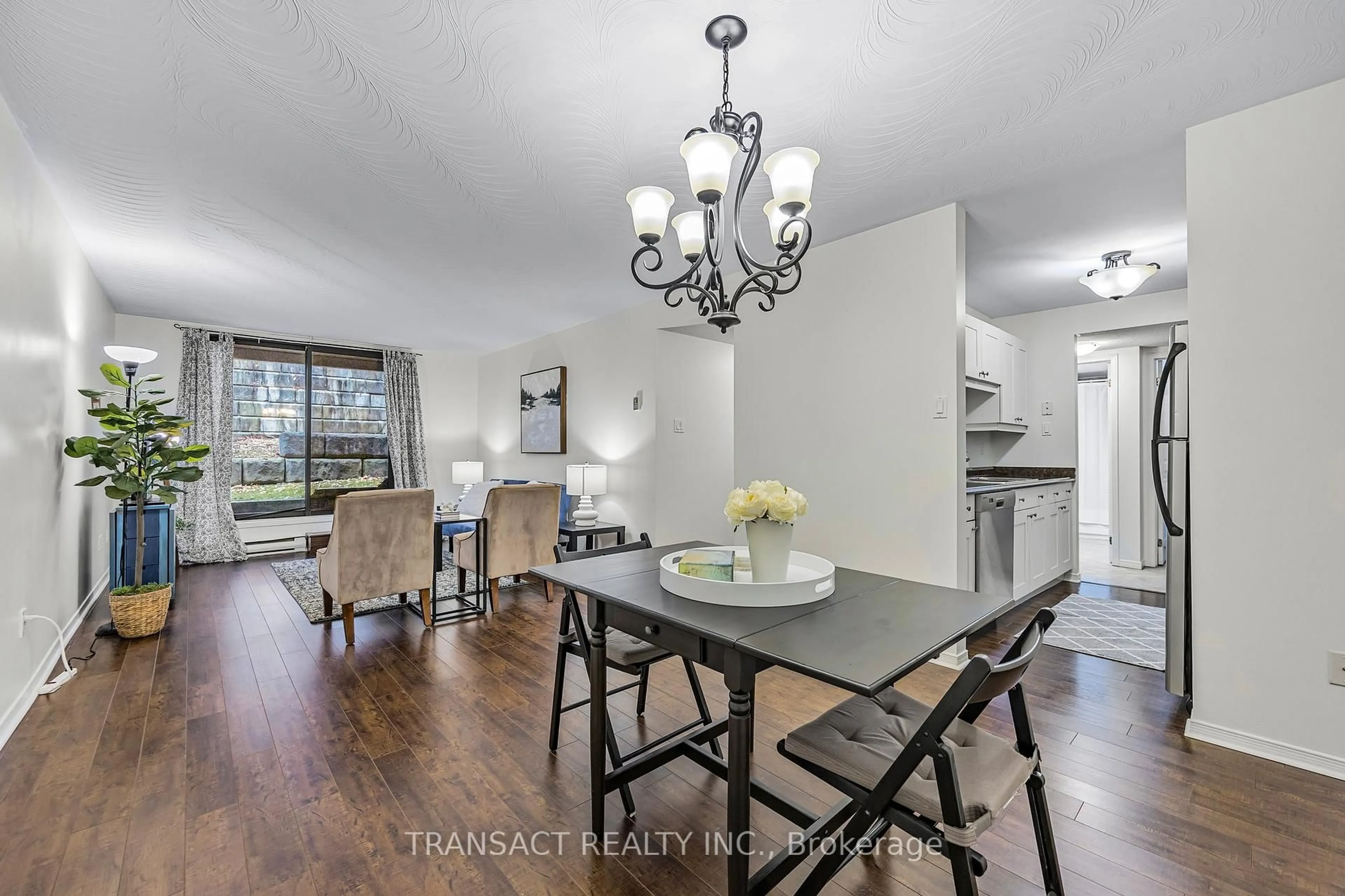 Dining room, wood/laminate floor for 25 Meadow Lane #108, Barrie Ontario L4N 7K2