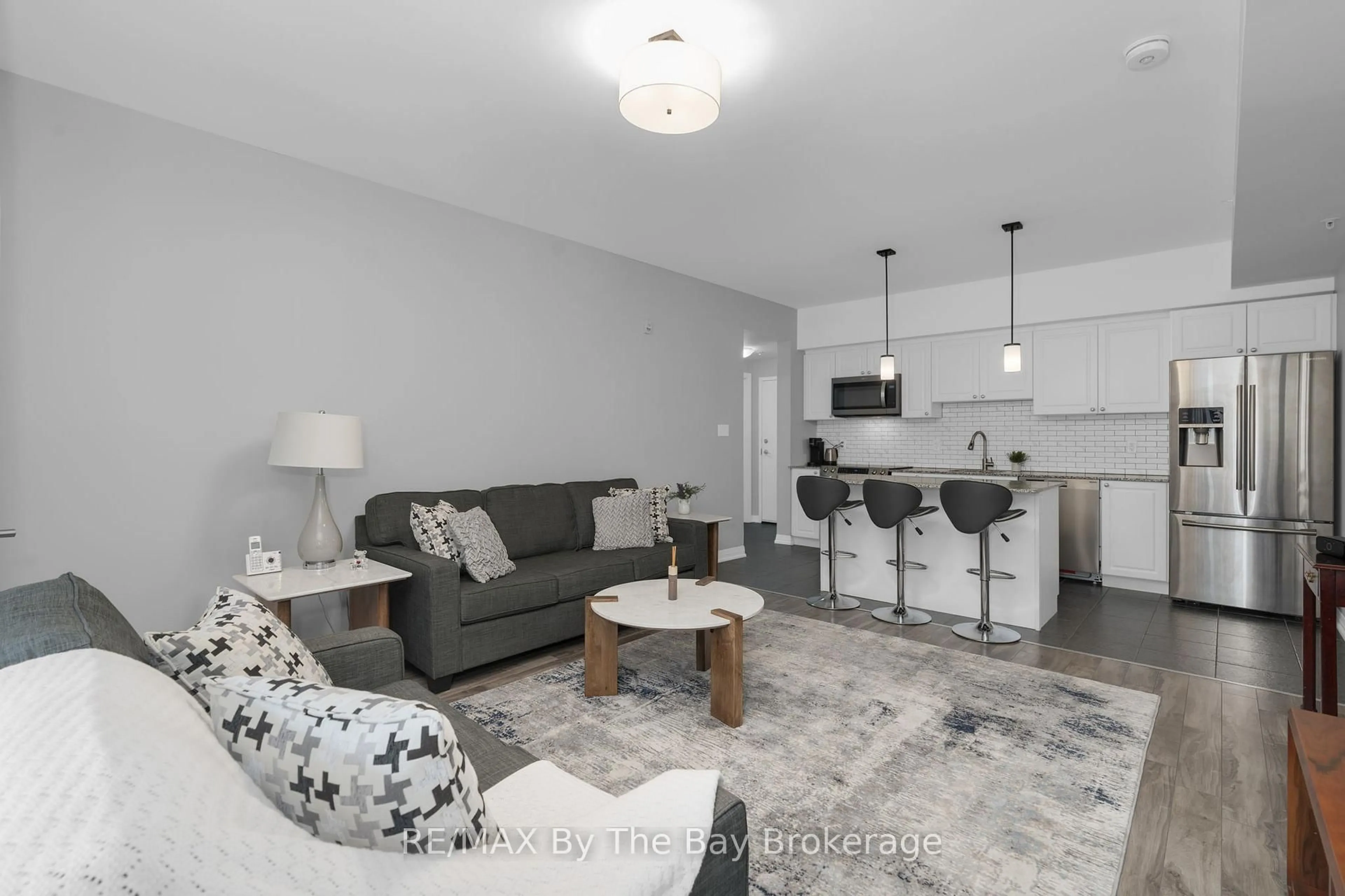 Living room with furniture, unknown for 300 ESSA Rd #309, Barrie Ontario L9J 0B9