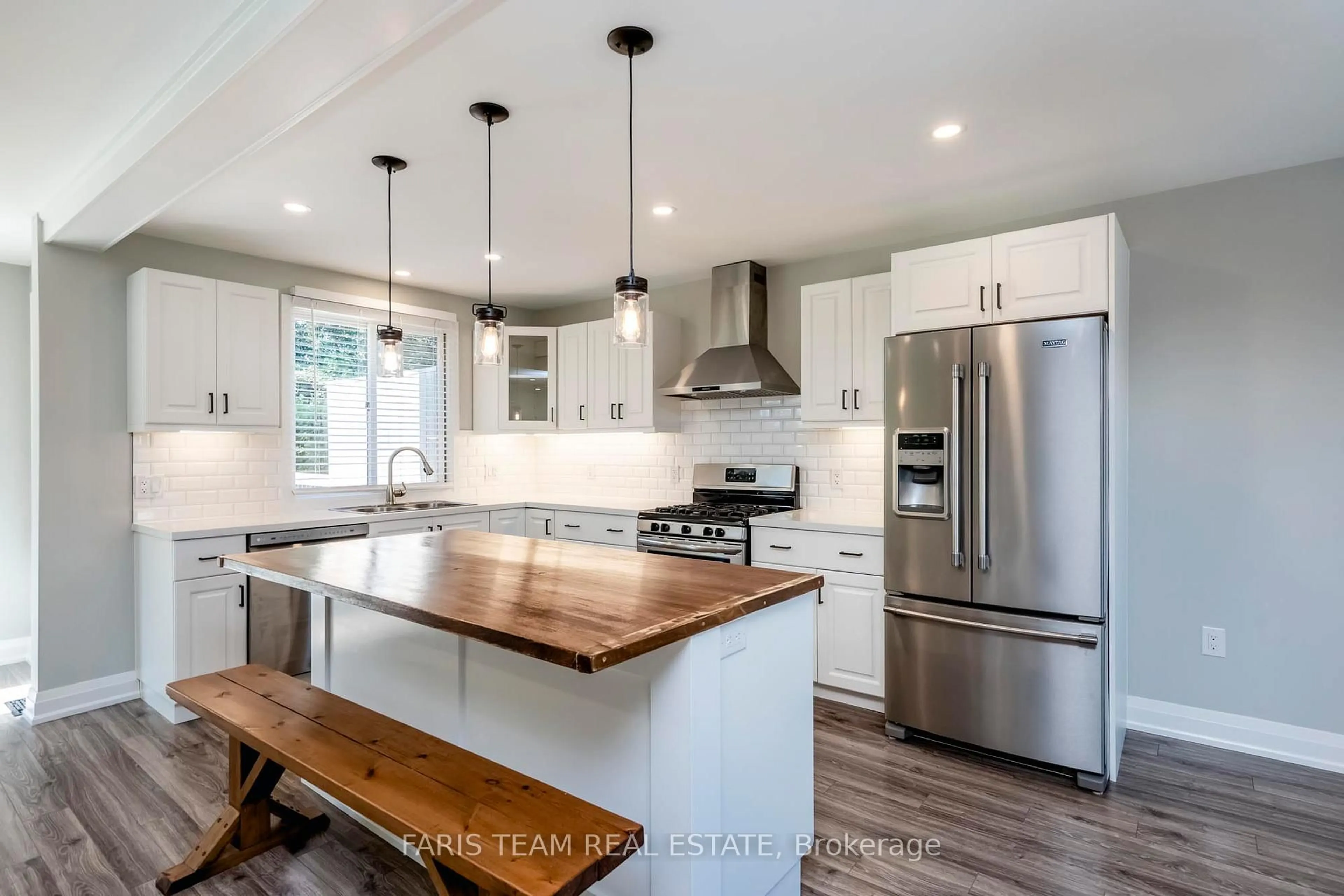 Open concept kitchen, wood/laminate floor for 12 Knicely Rd, Barrie Ontario L4N 6T8