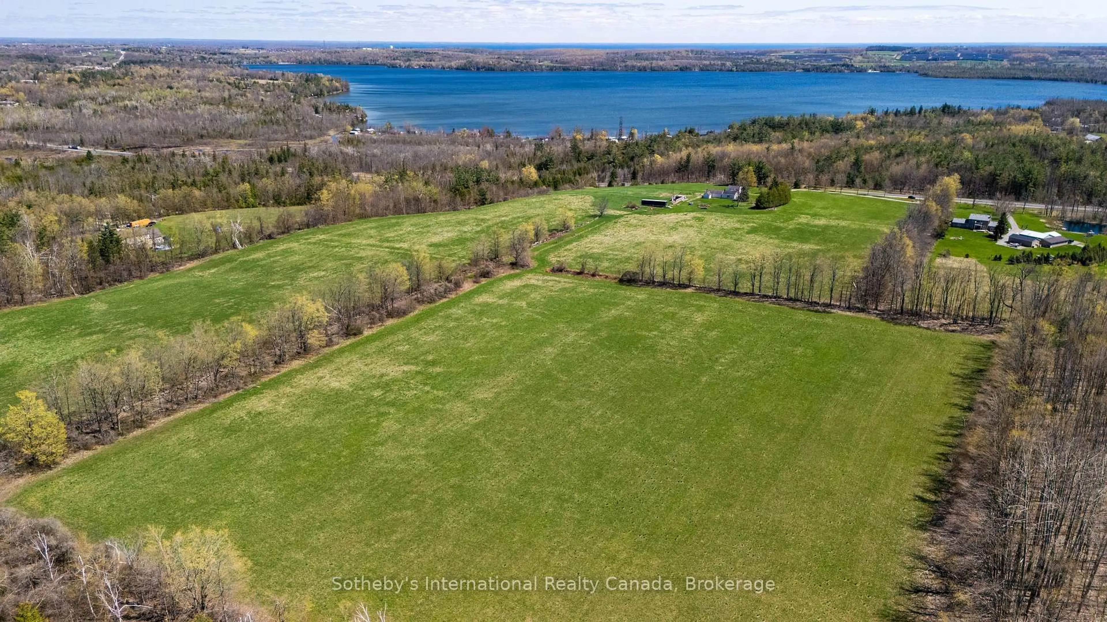 A pic from outside/outdoor area/front of a property/back of a property/a pic from drone, water/lake/river/ocean view for 1614 Horseshoe Valley Rd, Oro-Medonte Ontario L0K 1E0