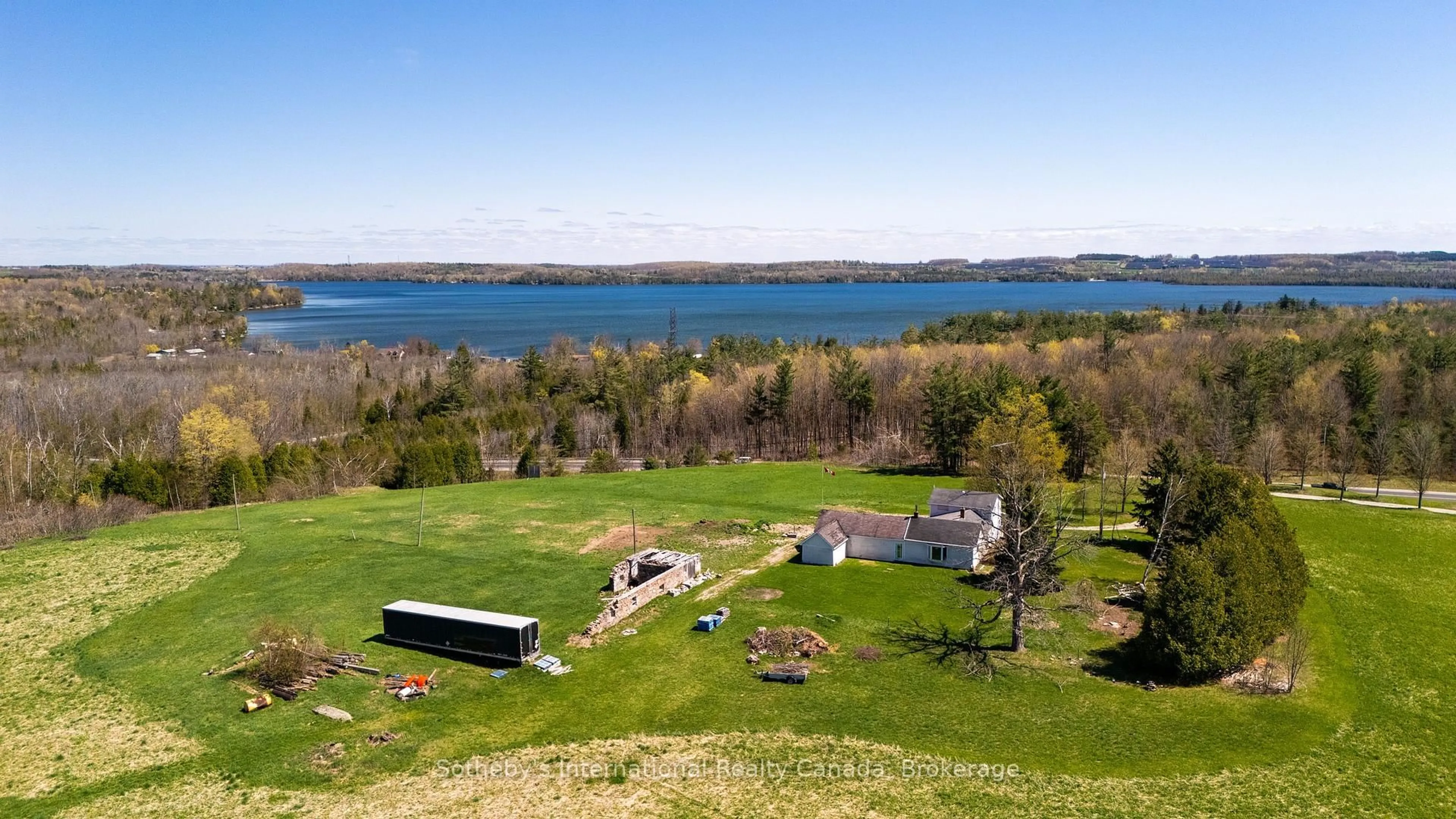 A pic from outside/outdoor area/front of a property/back of a property/a pic from drone, water/lake/river/ocean view for 1614 Horseshoe Valley Rd, Oro-Medonte Ontario L0K 1E0