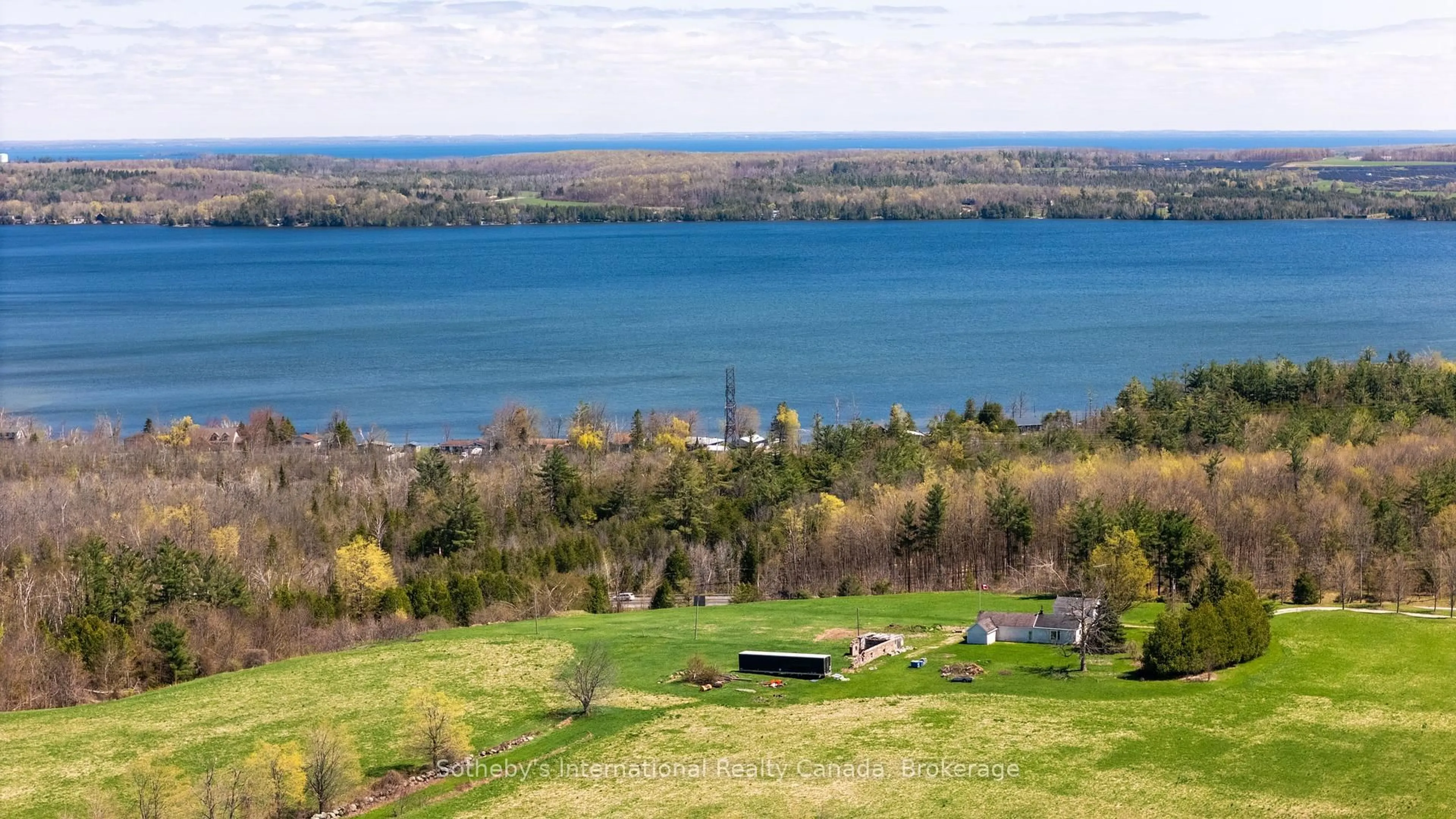 A pic from outside/outdoor area/front of a property/back of a property/a pic from drone, water/lake/river/ocean view for 1614 Horseshoe Valley Rd, Oro-Medonte Ontario L0K 1E0