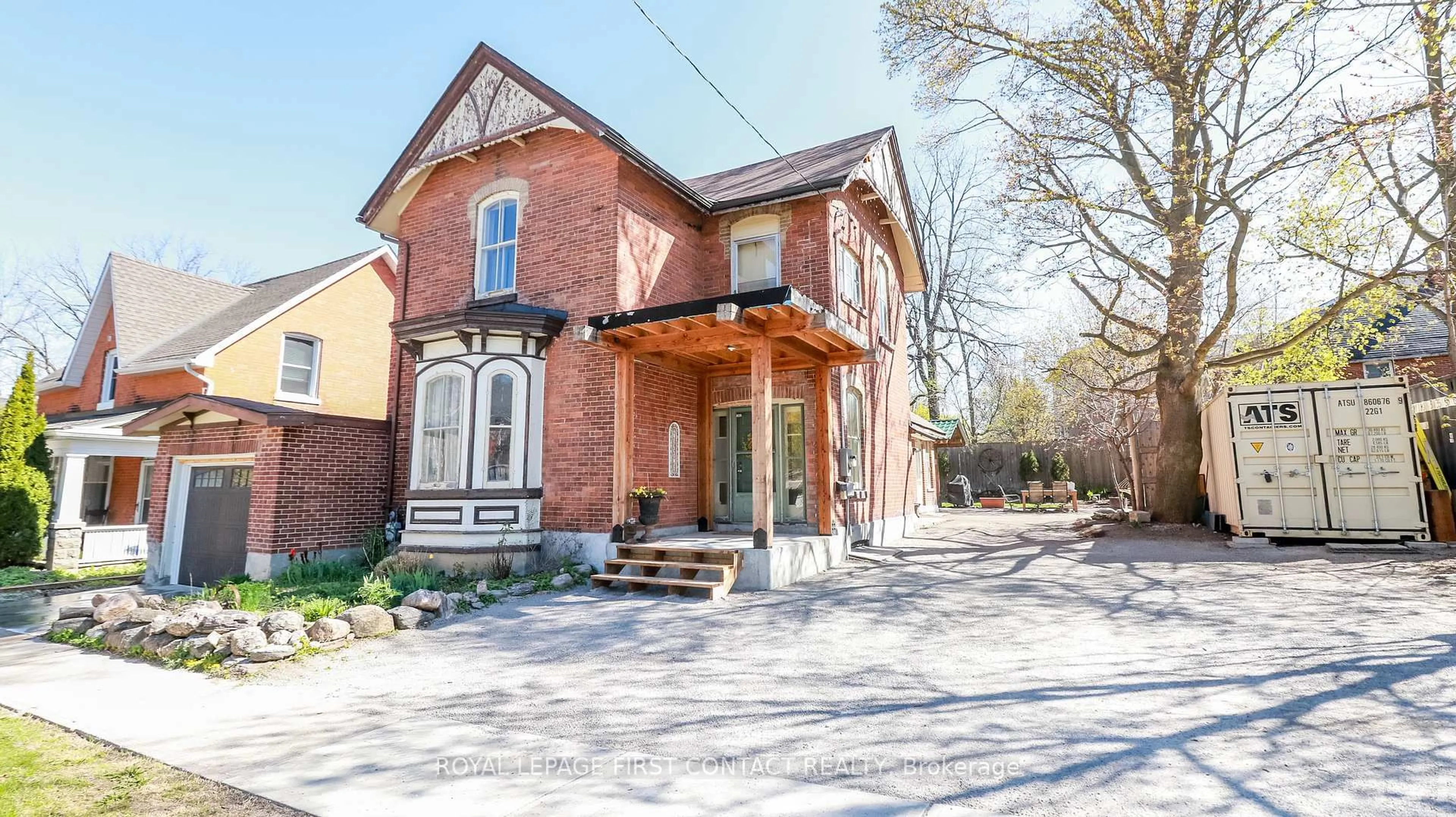 Home with brick exterior material, street for 121 Mulcaster St, Barrie Ontario L4M 3M8