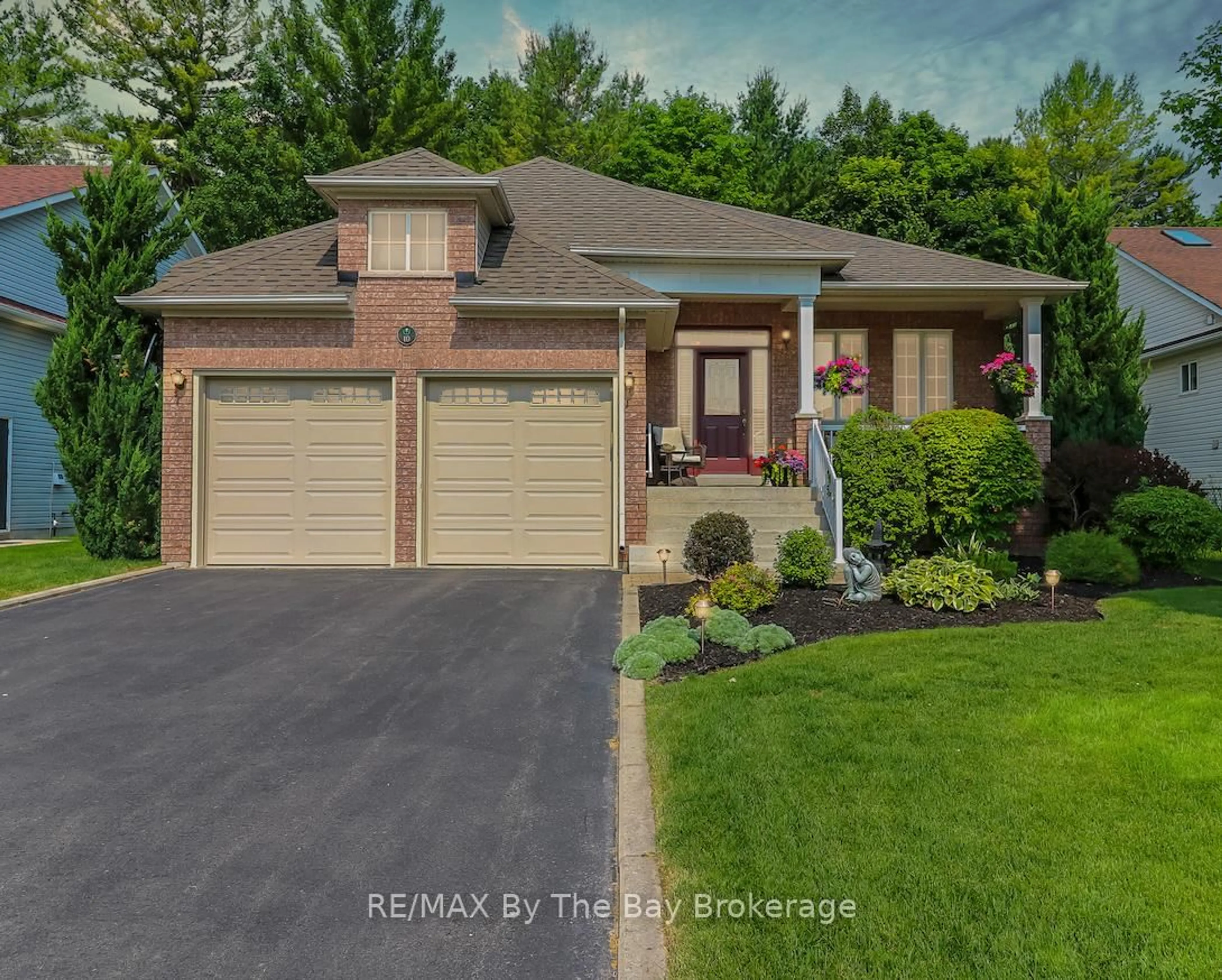 Home with brick exterior material, street for 10 MASTERS Lane, Wasaga Beach Ontario L9Z 1S9