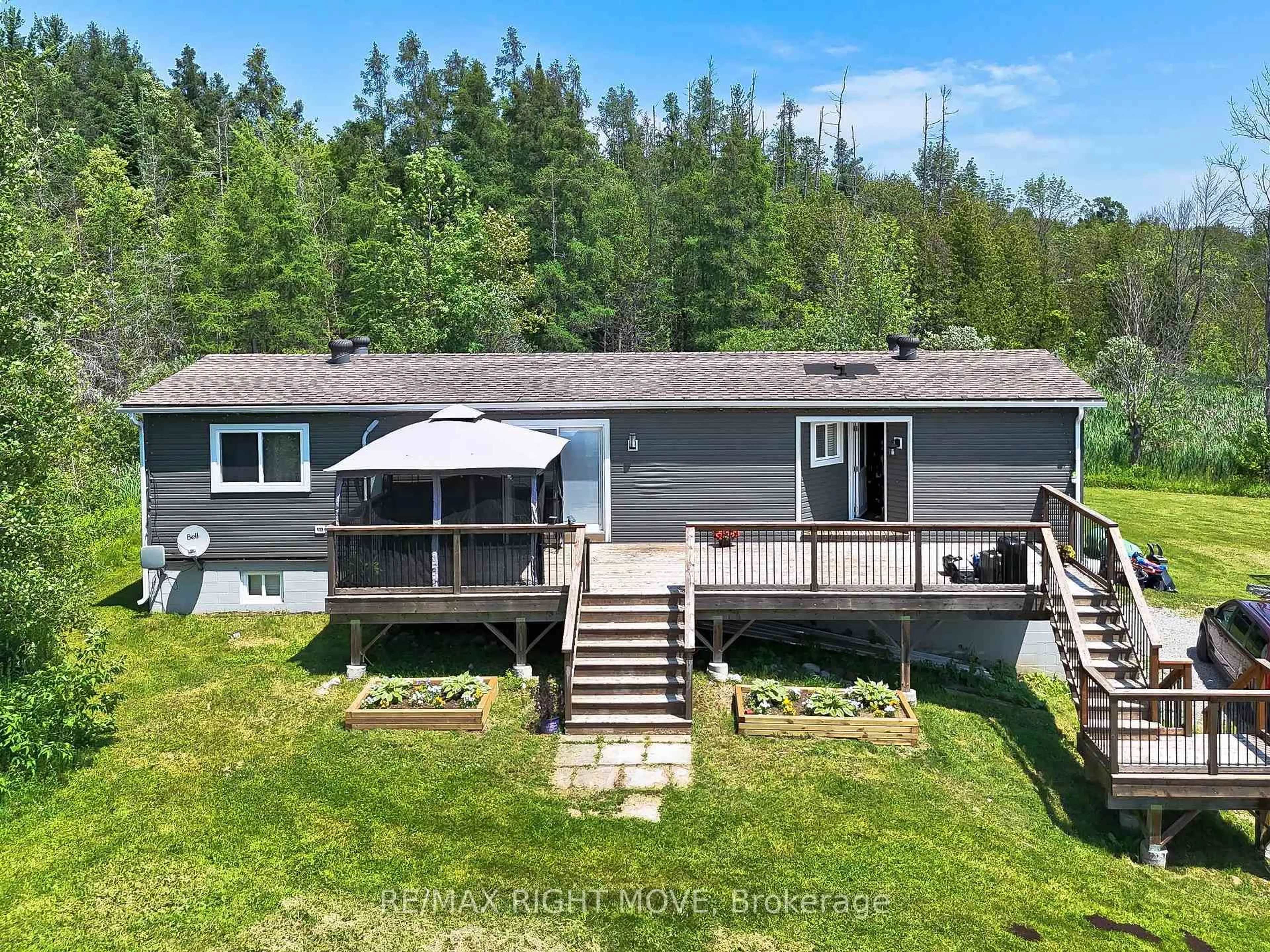 A pic from outside/outdoor area/front of a property/back of a property/a pic from drone, water/lake/river/ocean view for 447 13 Line, Oro-Medonte Ontario L3V 1T0