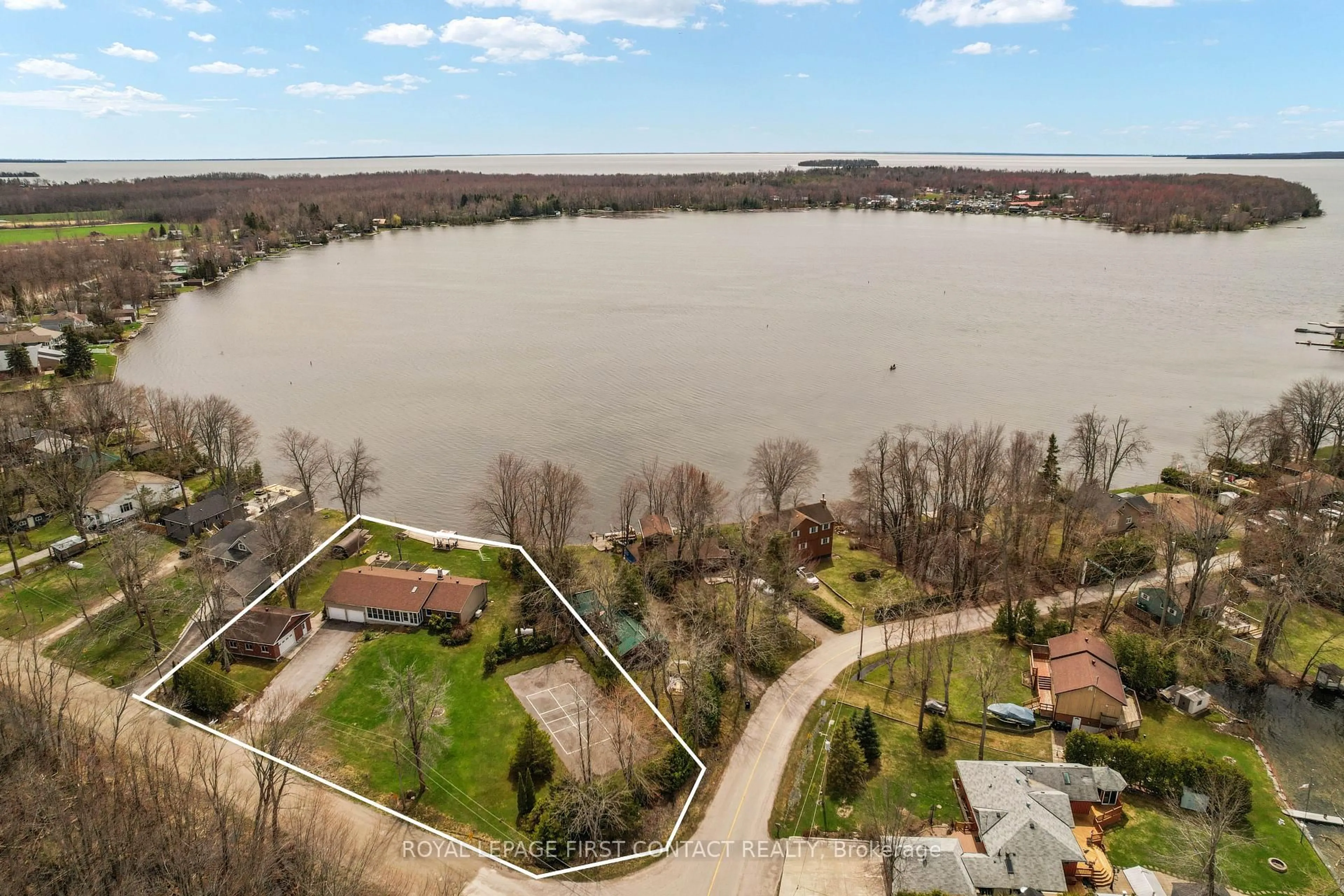 A pic from outside/outdoor area/front of a property/back of a property/a pic from drone, water/lake/river/ocean view for 4051 River Rd, Ramara Ontario L3V 6H7