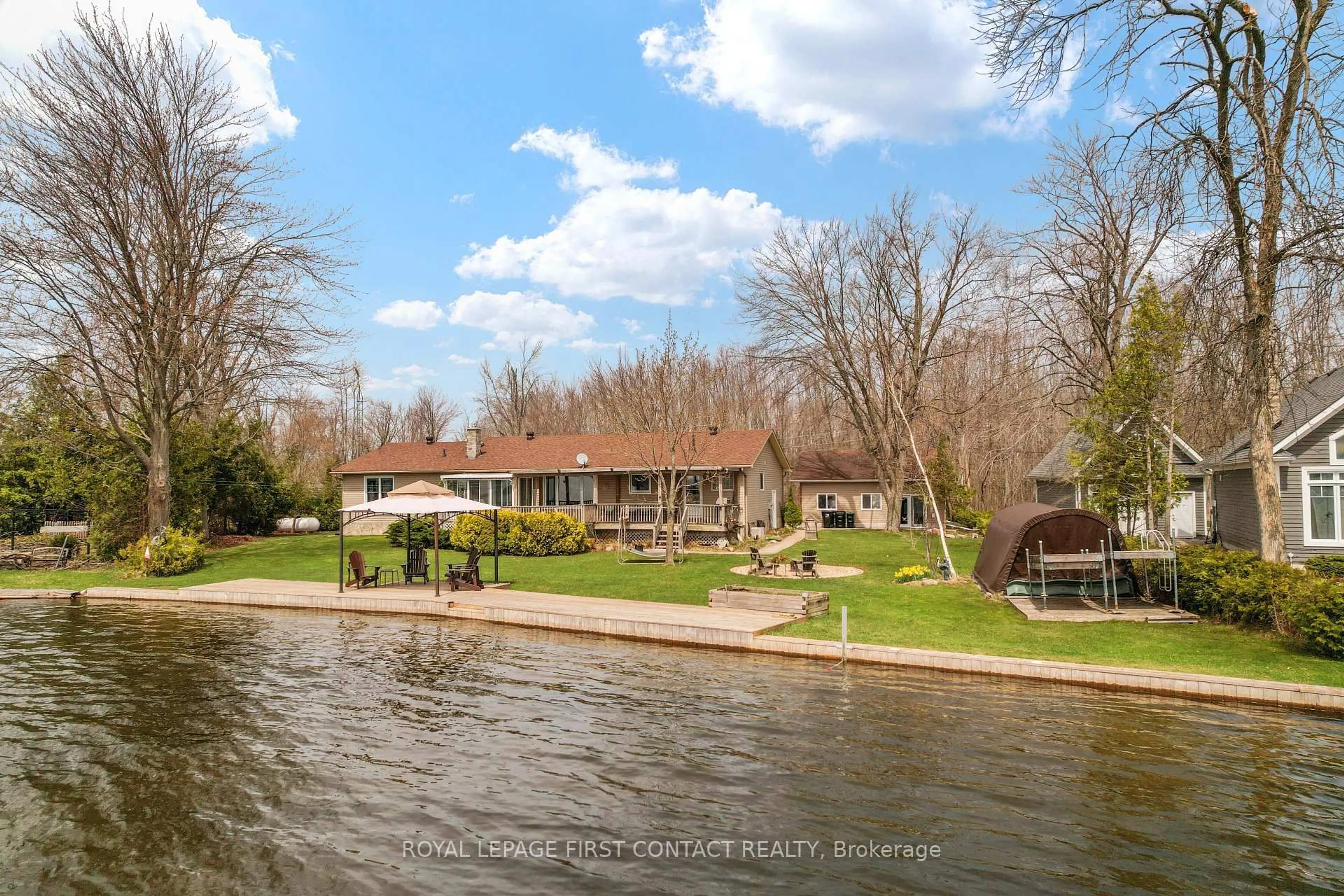 A pic from outside/outdoor area/front of a property/back of a property/a pic from drone, water/lake/river/ocean view for 4051 River Rd, Ramara Ontario L3V 6H7