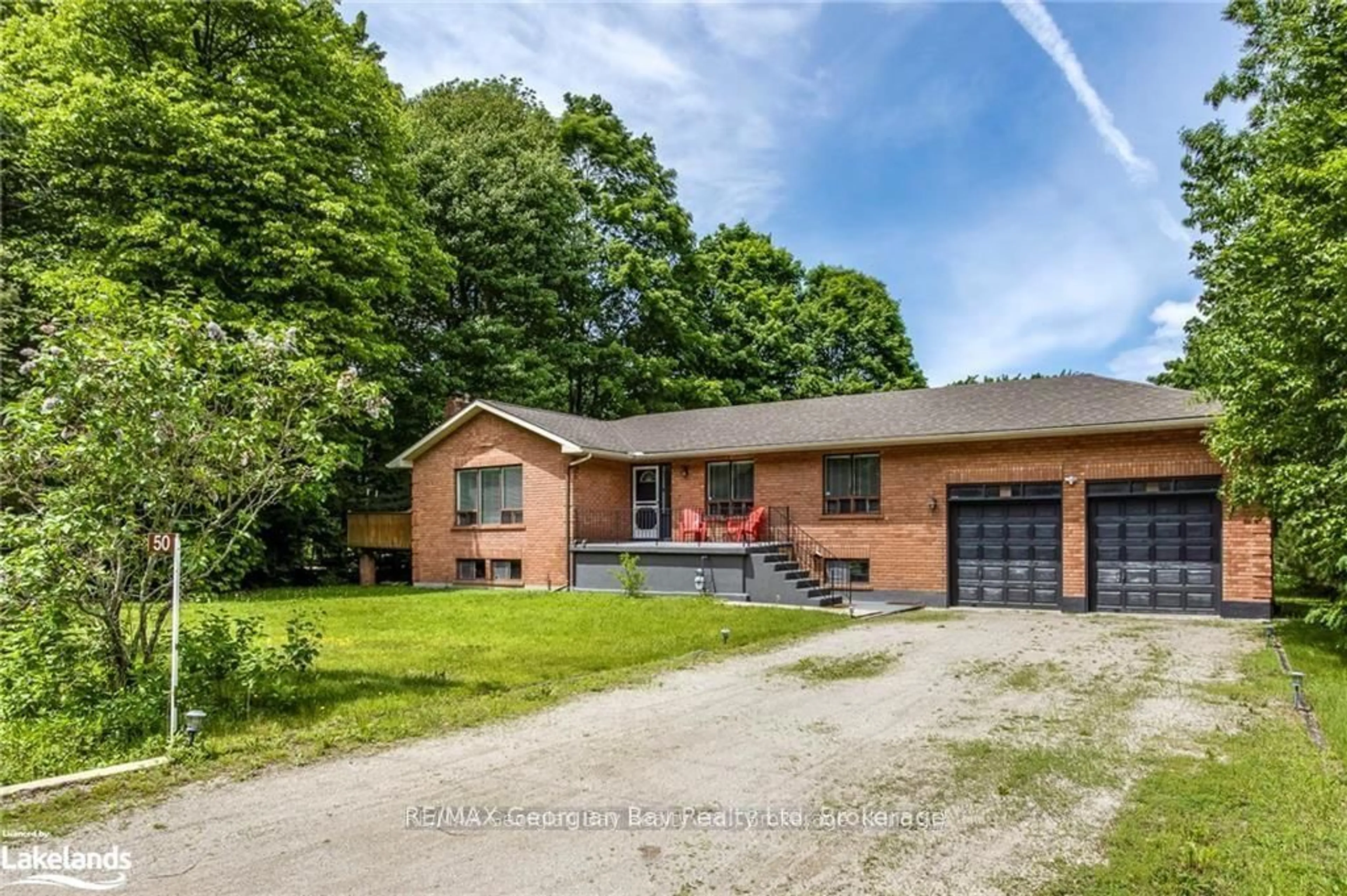 Home with brick exterior material, street for 50 Leonard Rd, Tiny Ontario L9M 2H7