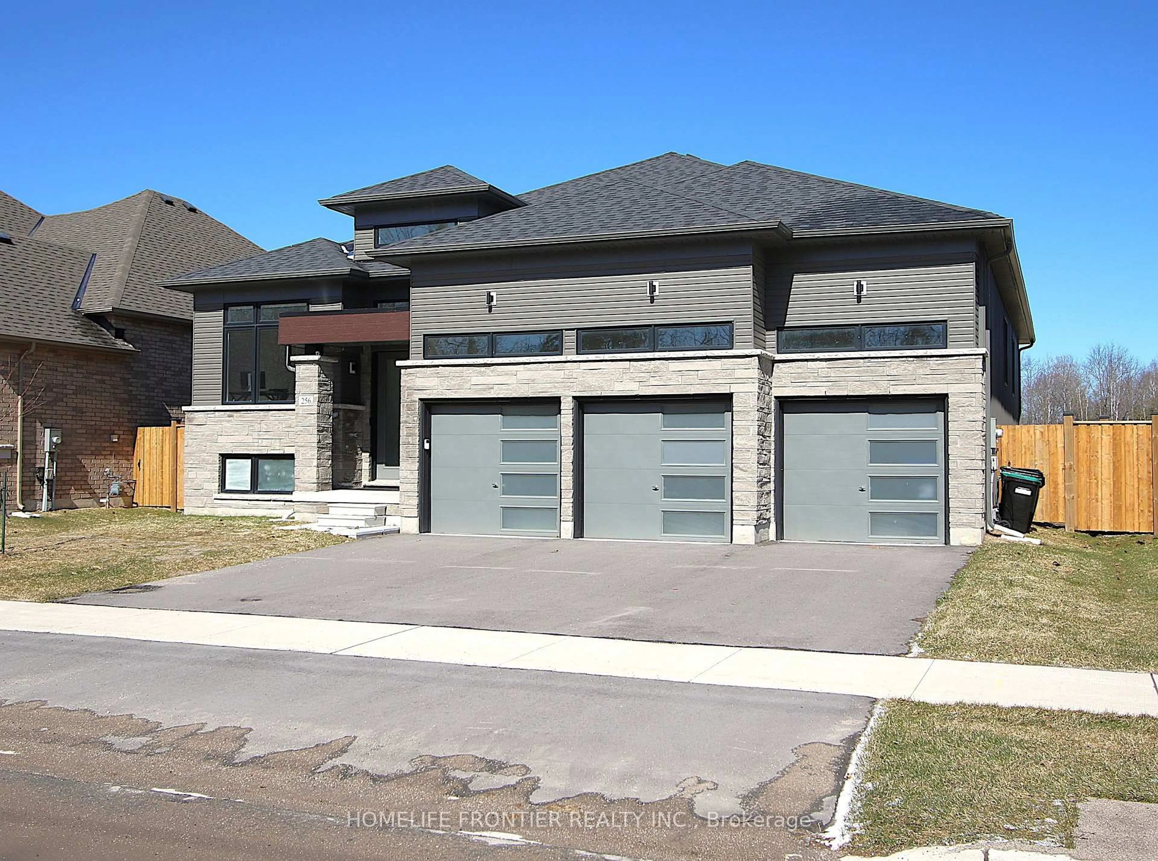 Home with brick exterior material, street for 256 Ramblewood Dr, Wasaga Beach Ontario L9Z 3A5