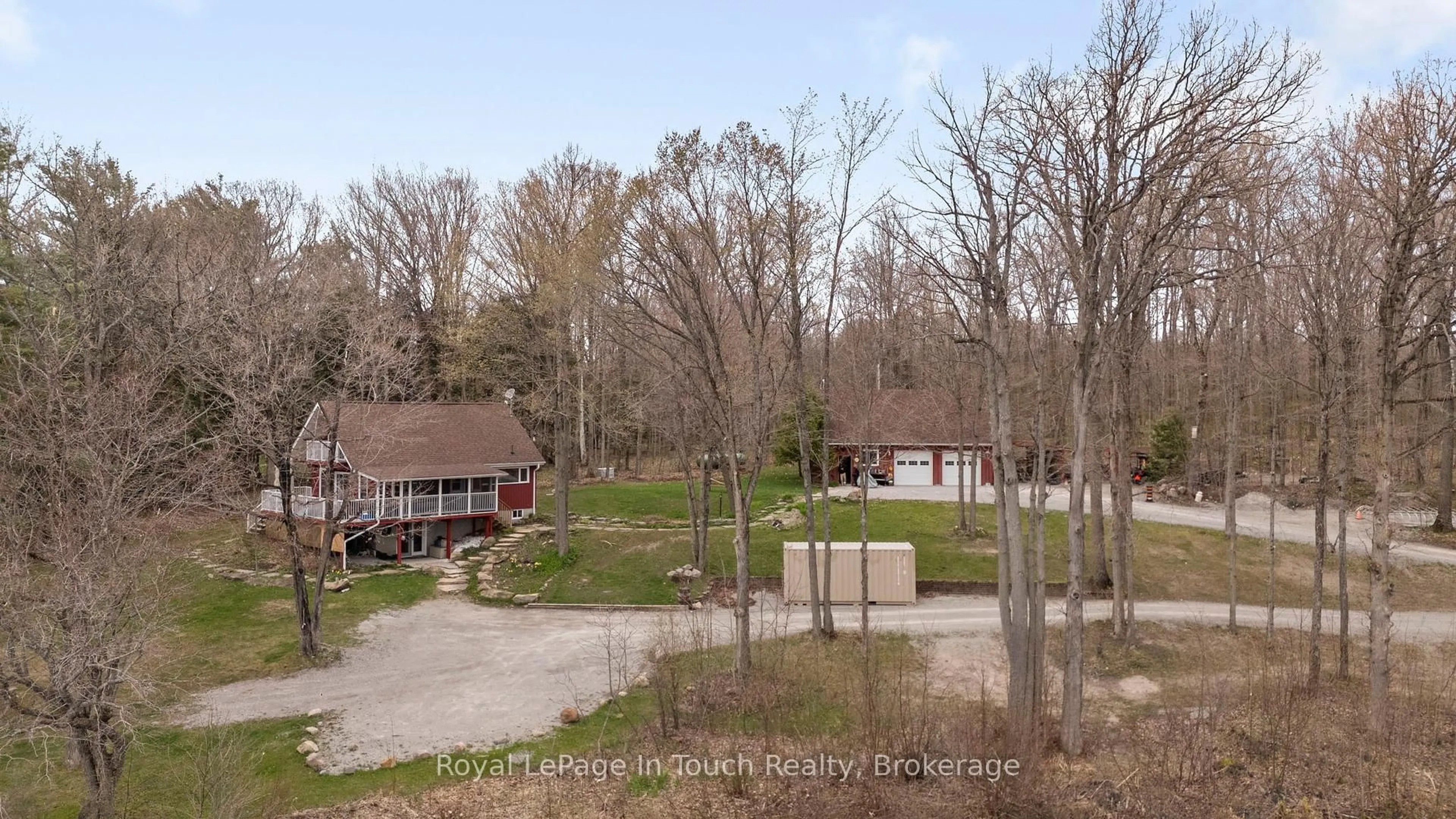 A pic from outside/outdoor area/front of a property/back of a property/a pic from drone, forest/trees view for 1472 Otter Point Rd, Severn Ontario L0K 1E0