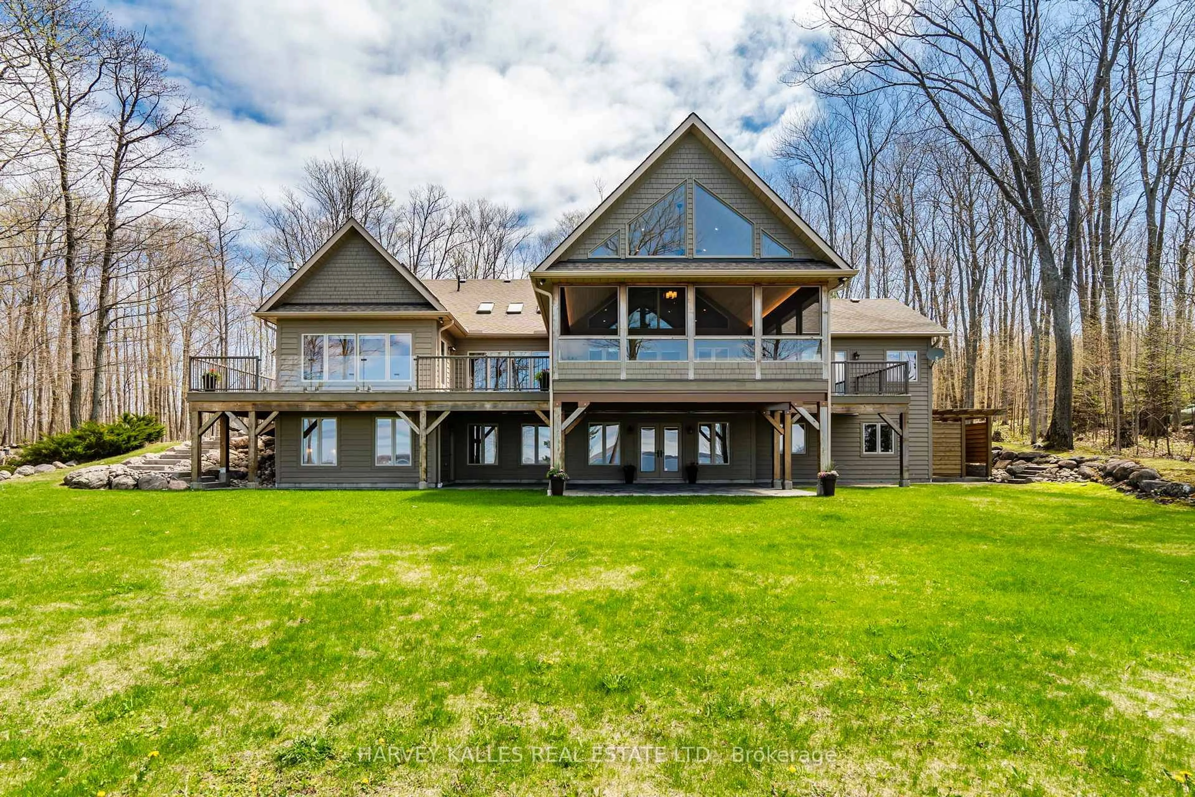 A pic from outside/outdoor area/front of a property/back of a property/a pic from drone, water/lake/river/ocean view for 20 Nippissing Ridge Rd, Tiny Ontario L9M 0T8