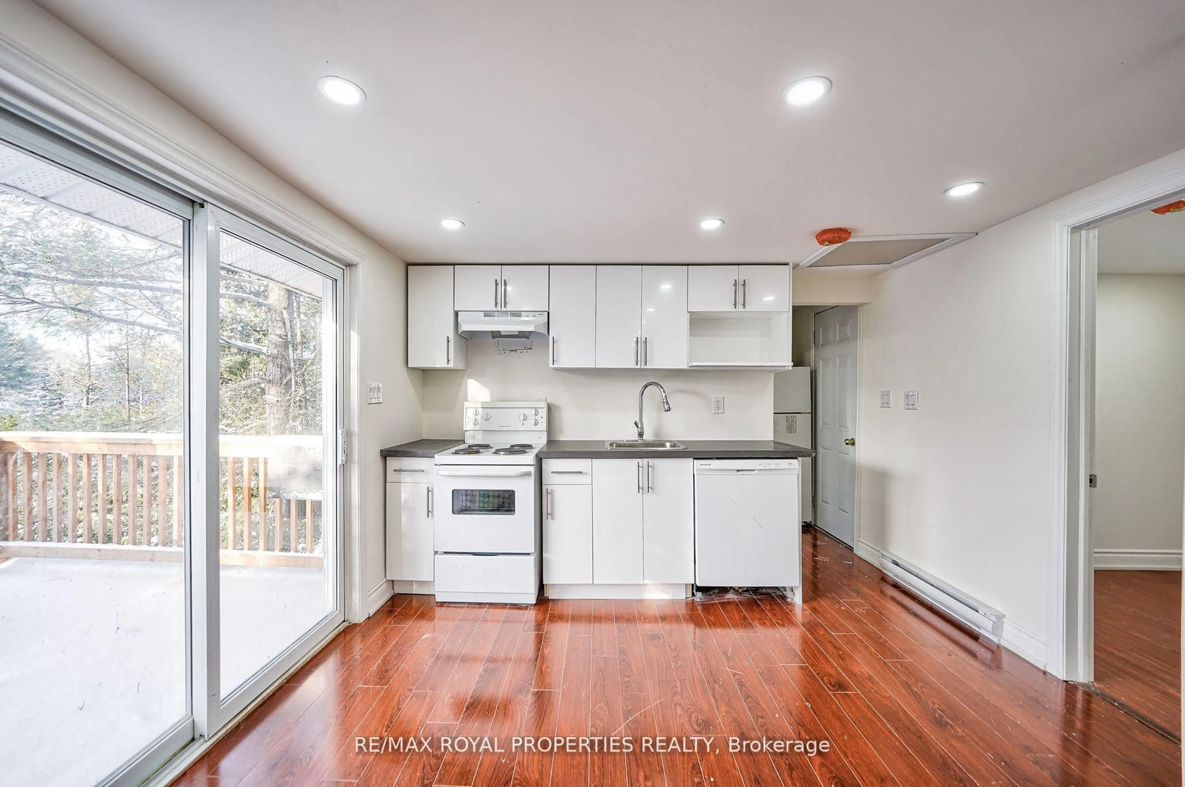 Open concept kitchen, wood/laminate floor for 8144 Laidlaw Ave, Ramara Ontario L0K 2B0