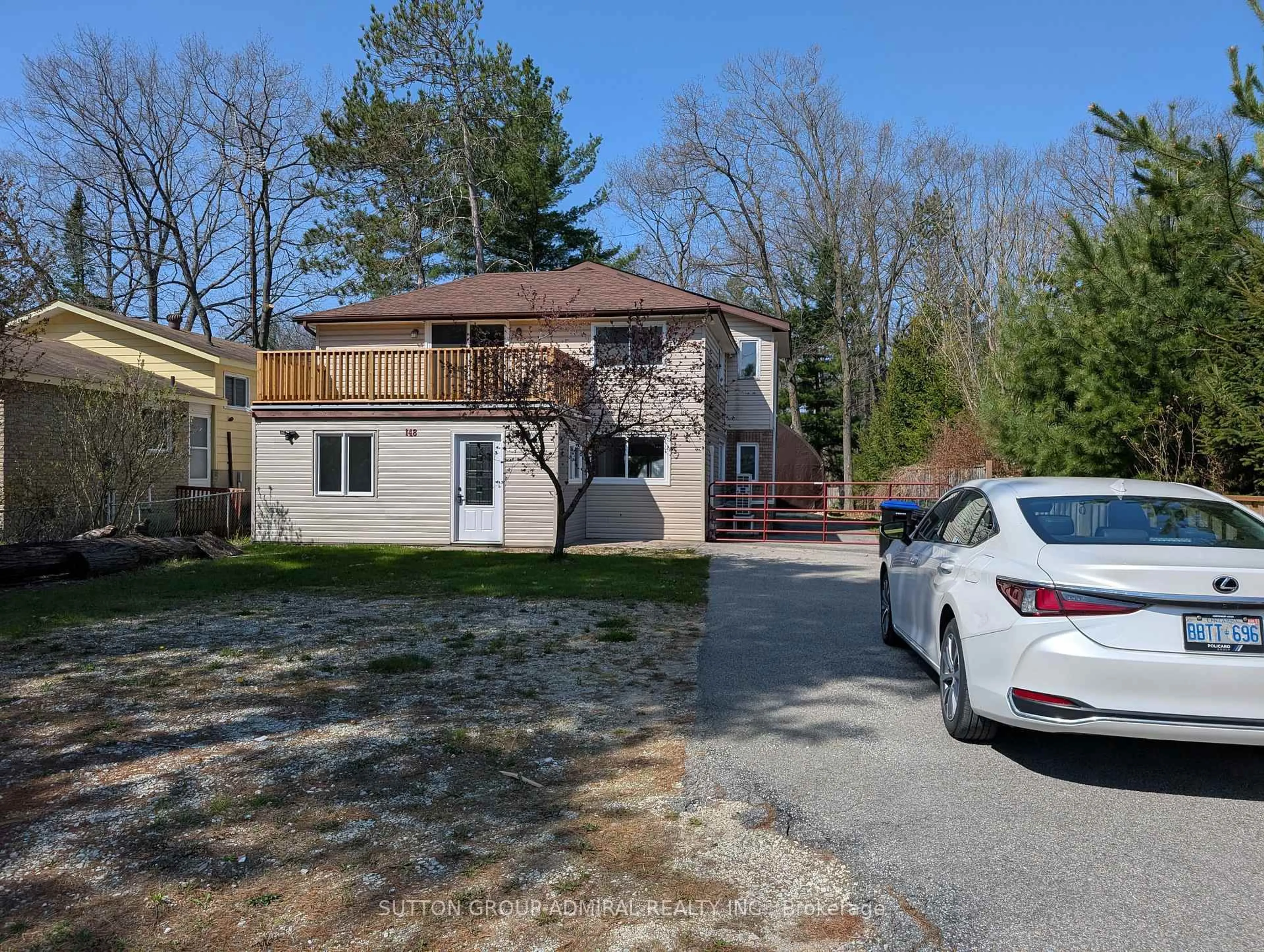 A pic from outside/outdoor area/front of a property/back of a property/a pic from drone, street for 148 Melrose Ave, Wasaga Beach Ontario L9Z 2T1