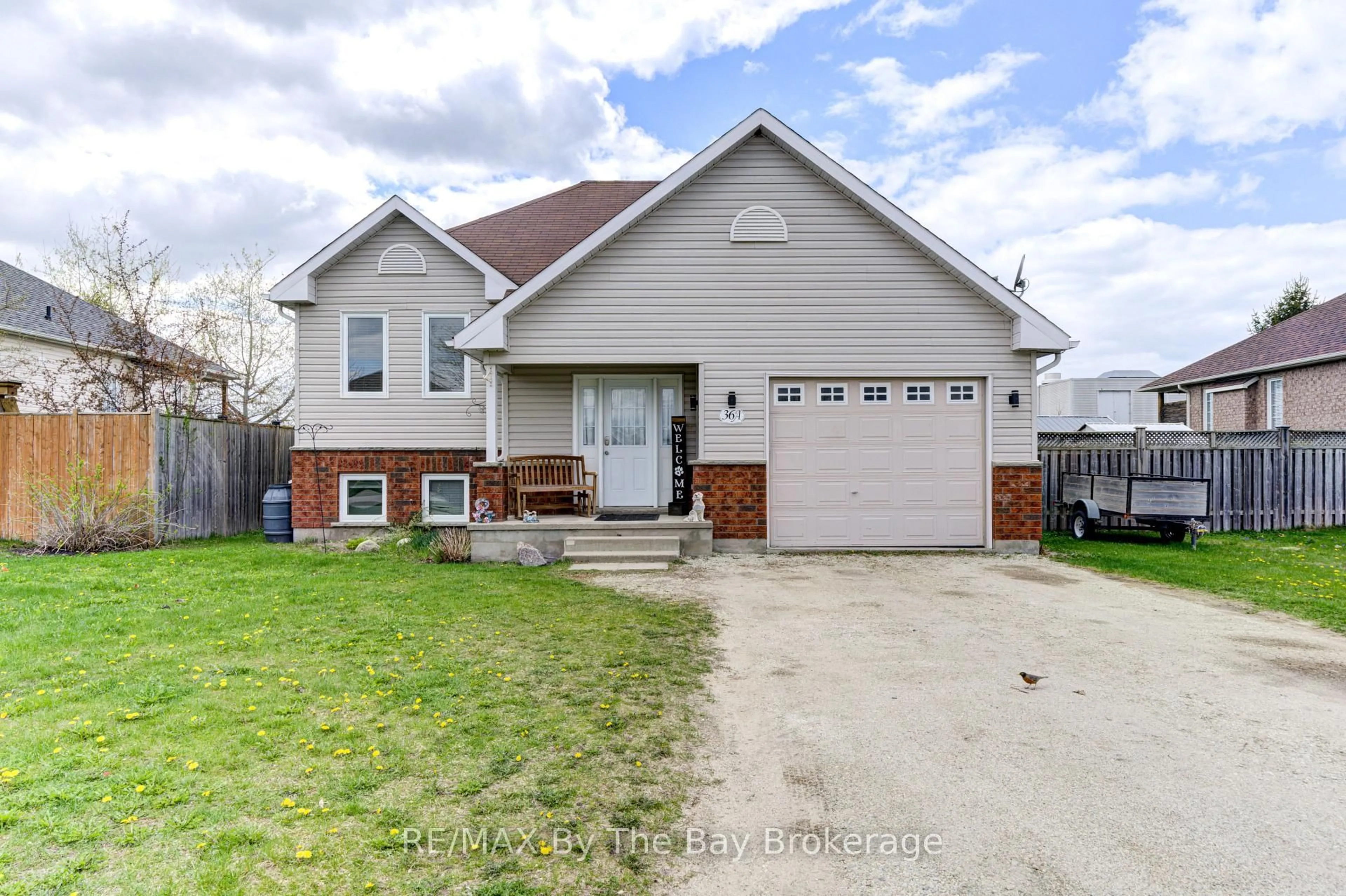 Home with brick exterior material, street for 36A Meadowlark Blvd, Wasaga Beach Ontario L9Z 3B2