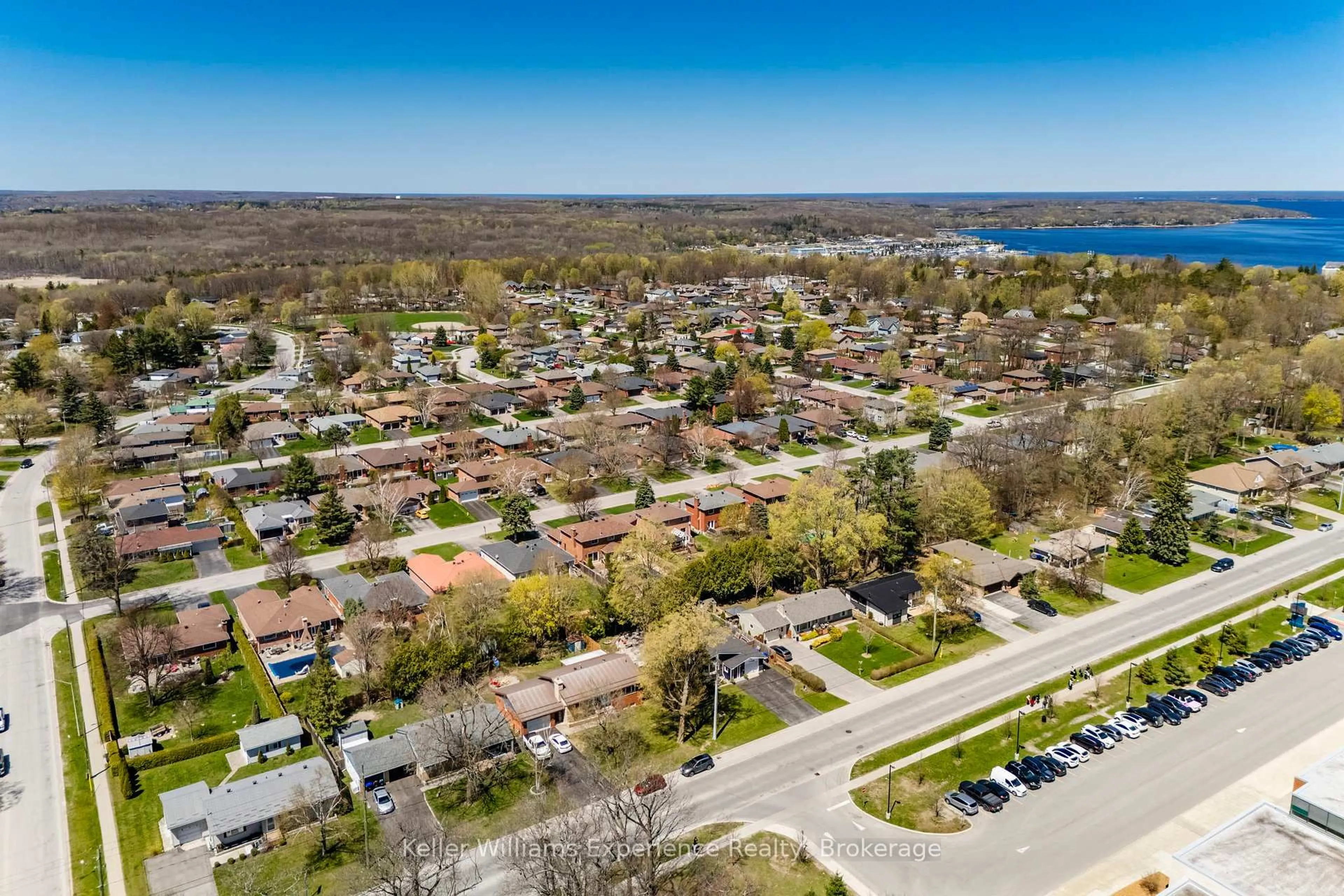 A pic from outside/outdoor area/front of a property/back of a property/a pic from drone, water/lake/river/ocean view for 954 Hugel Ave, Midland Ontario L4R 1X6