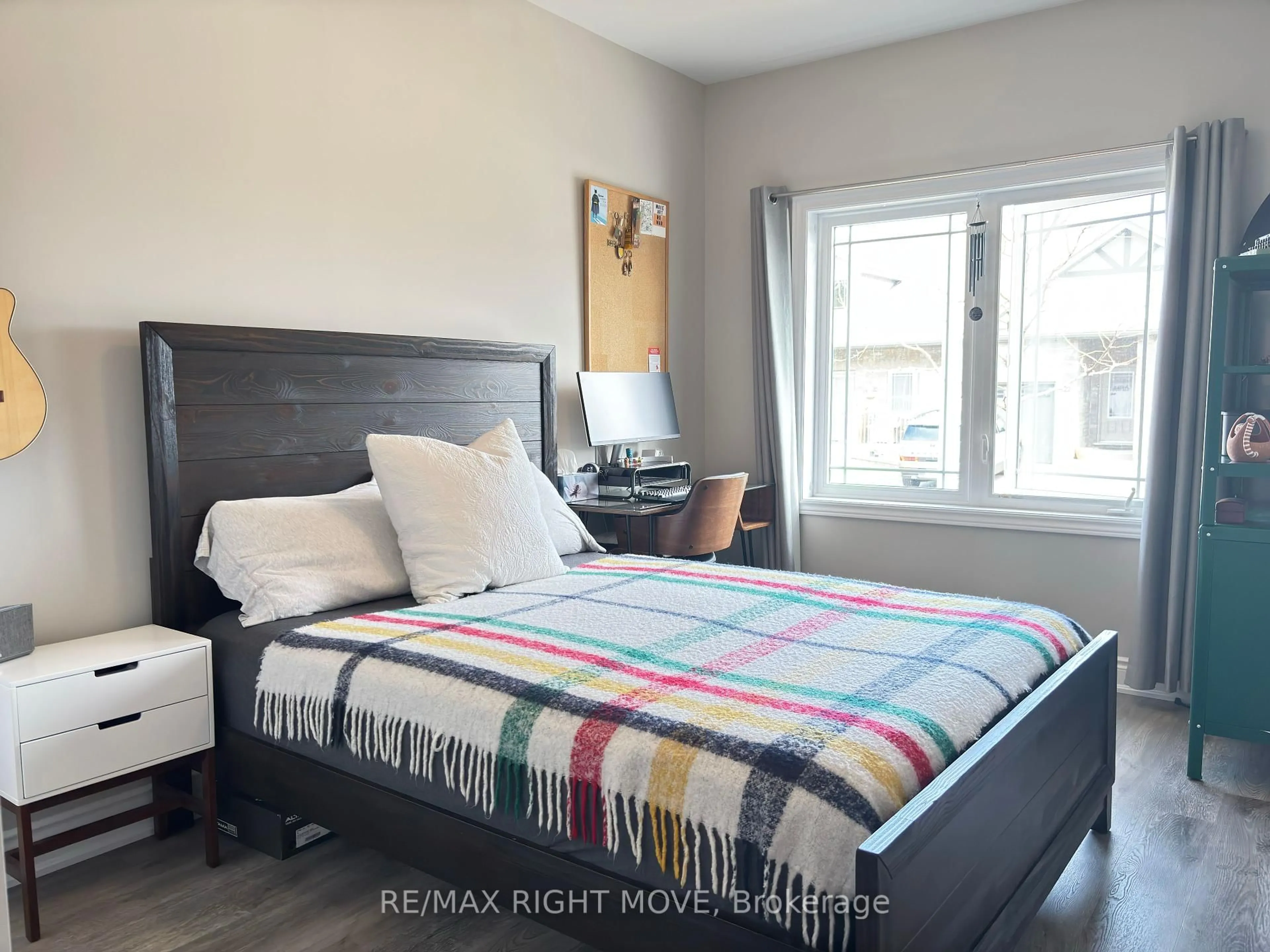 Bedroom with bed, wood/laminate floor for 321 Lucy Lane, Orillia Ontario L3V 8L3