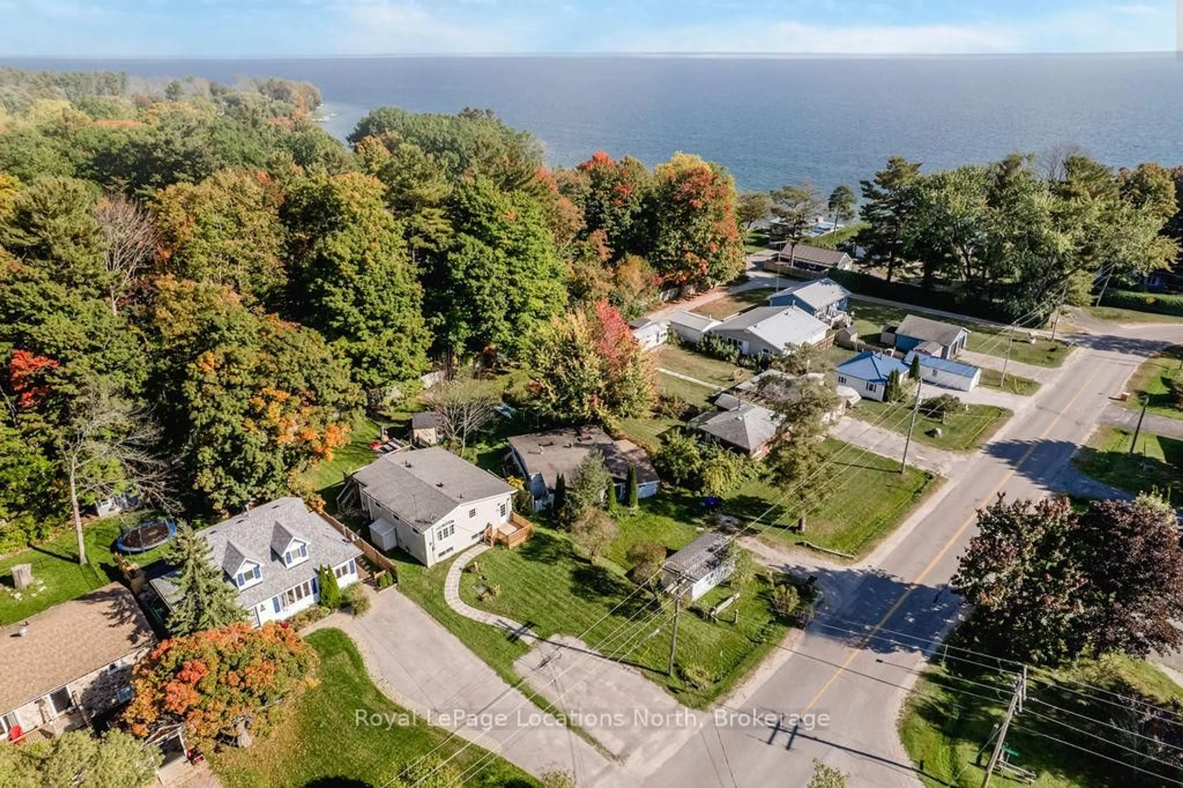 A pic from outside/outdoor area/front of a property/back of a property/a pic from drone, water/lake/river/ocean view for 53 Lakeshore Rd, Oro-Medonte Ontario L0L 2E0