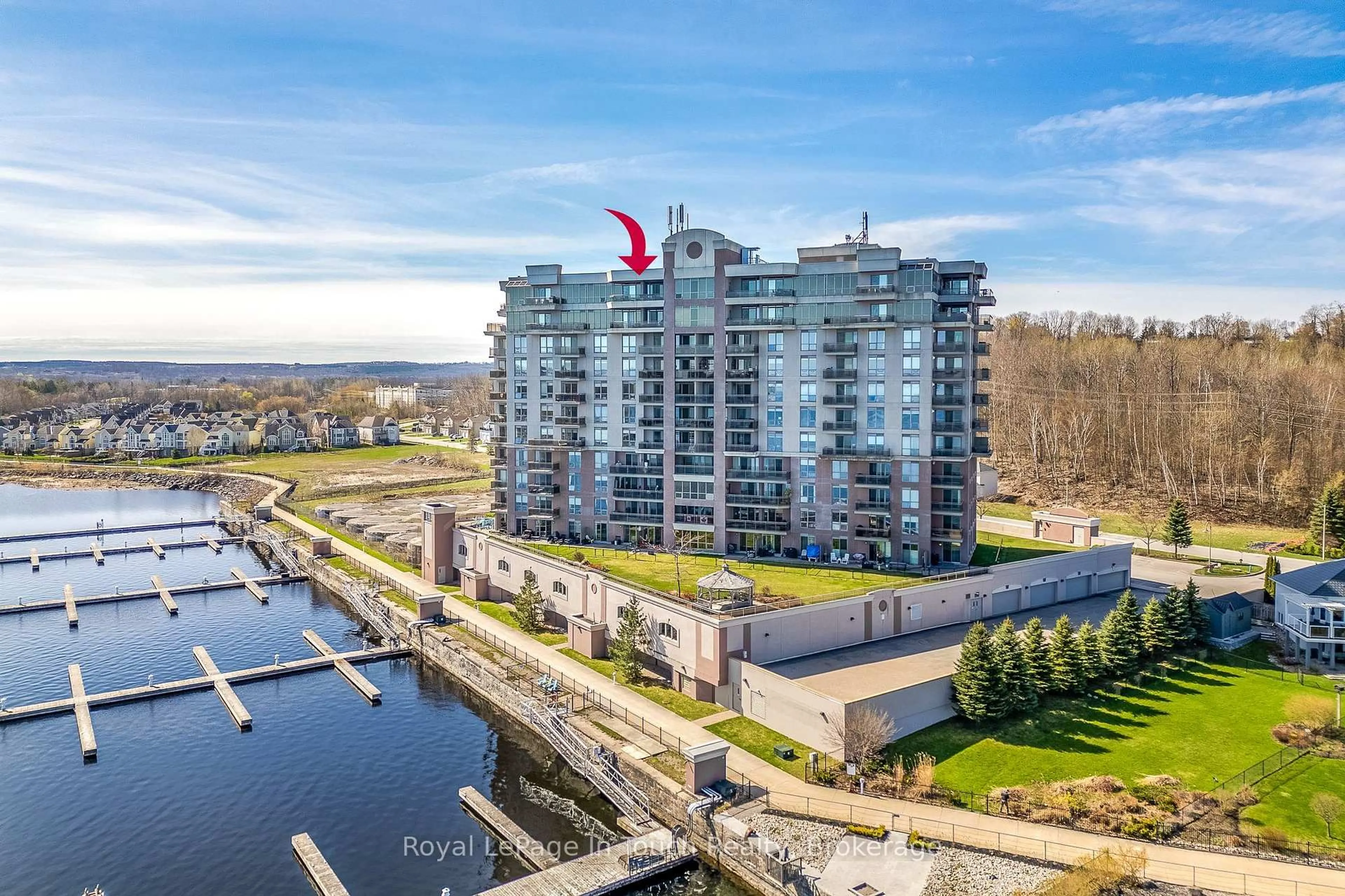 A pic from outside/outdoor area/front of a property/back of a property/a pic from drone, water/lake/river/ocean view for 699 Aberdeen Blvd #UPH3, Midland Ontario L4R 5P2