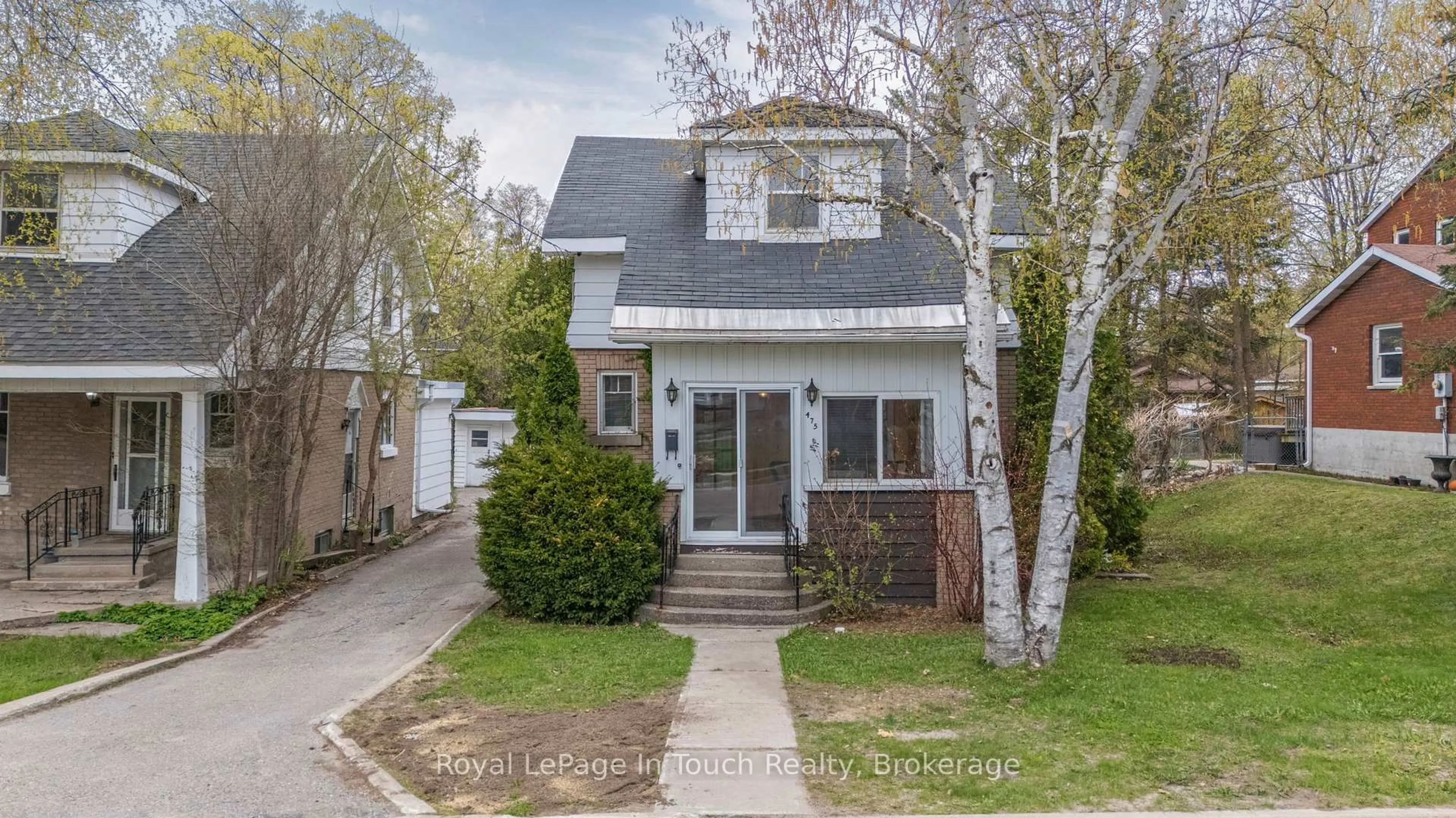 Home with brick exterior material, street for 475 Midland Ave, Midland Ontario L4R 3L4