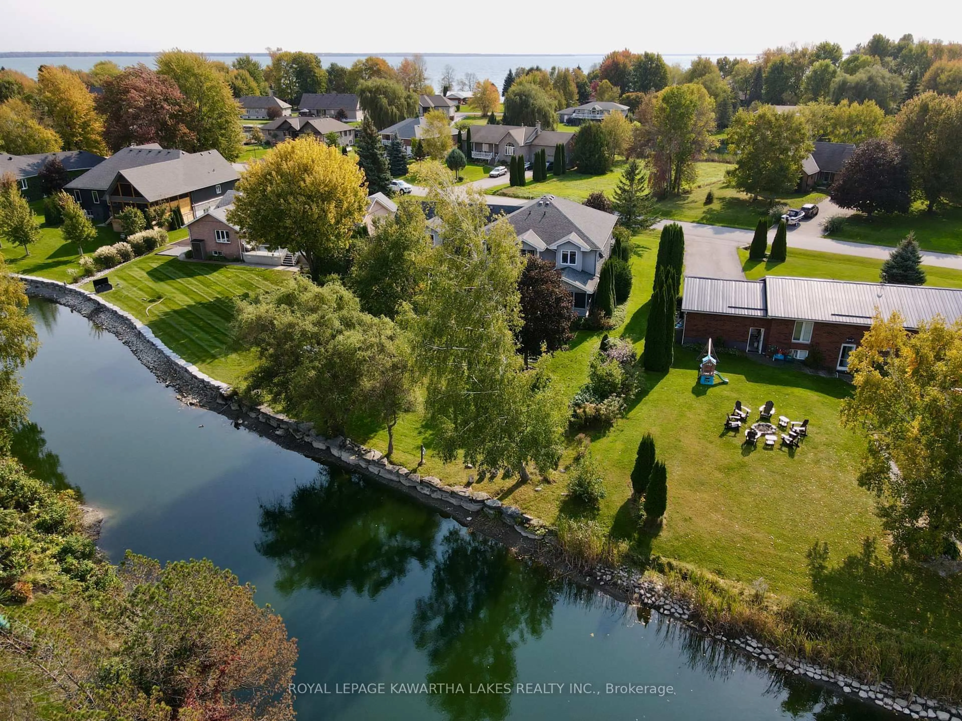 A pic from outside/outdoor area/front of a property/back of a property/a pic from drone, water/lake/river/ocean view for 26 Maple Gate, Ramara Ontario L0K 1B0