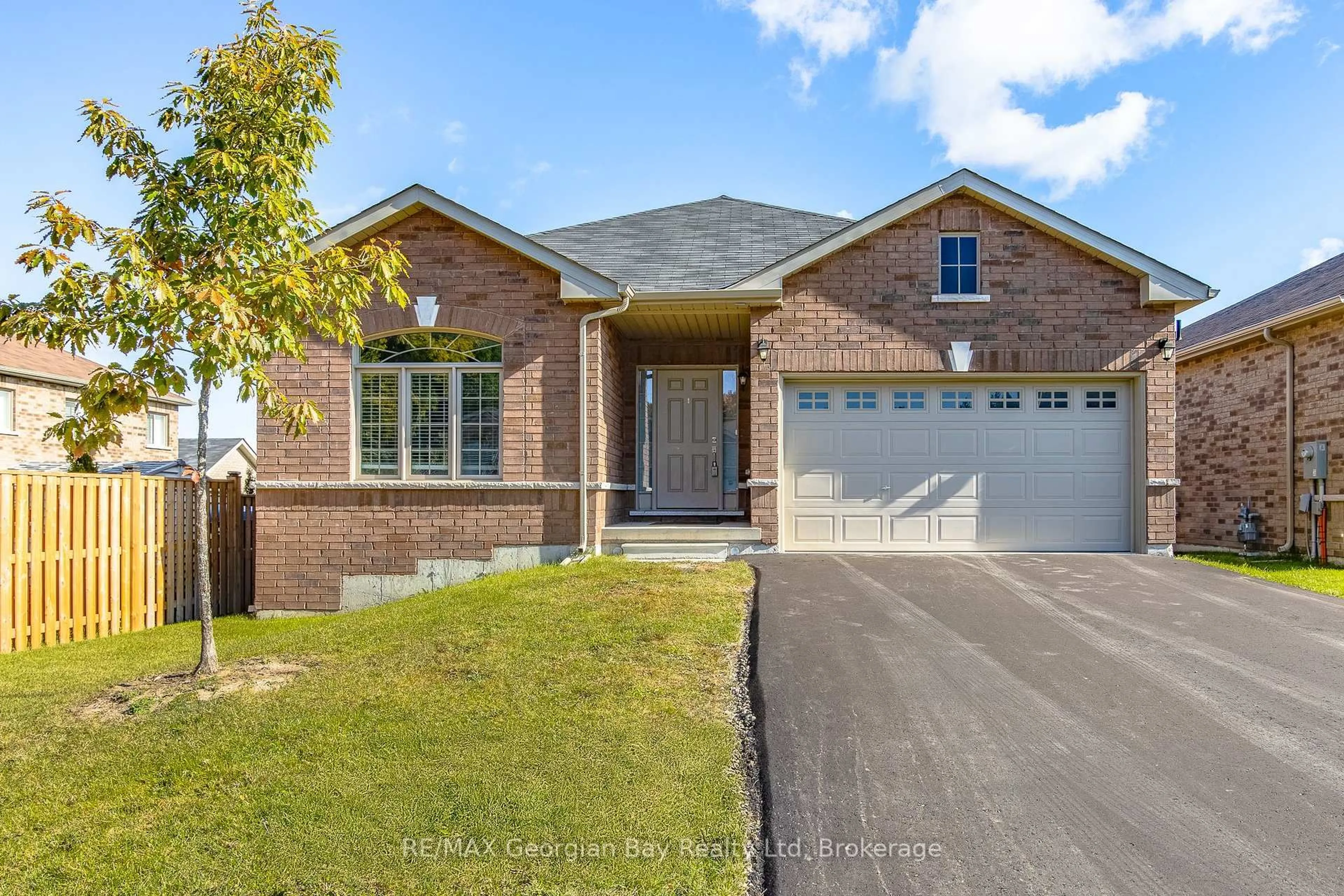 Home with brick exterior material, street for 14 BEAUSOLEIL DRIVE N/A, Penetanguishene Ontario L9M 0V8