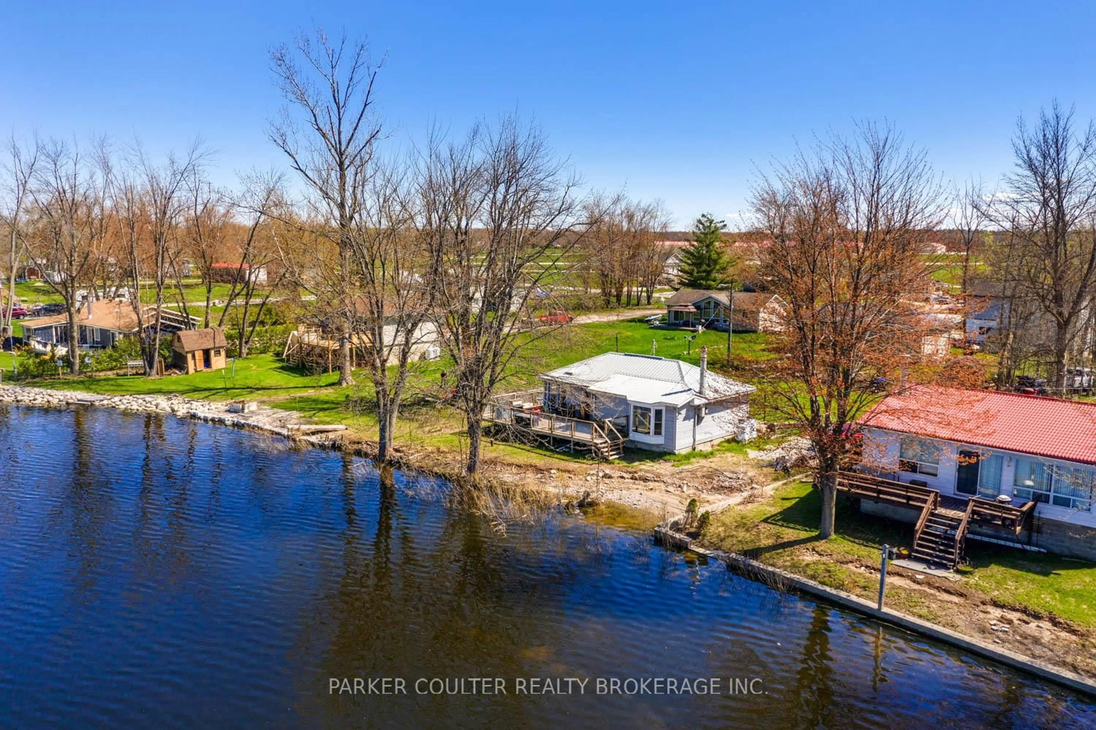 A pic from outside/outdoor area/front of a property/back of a property/a pic from drone, water/lake/river/ocean view for 6222 Bluebird St, Ramara Ontario L3V 0K6