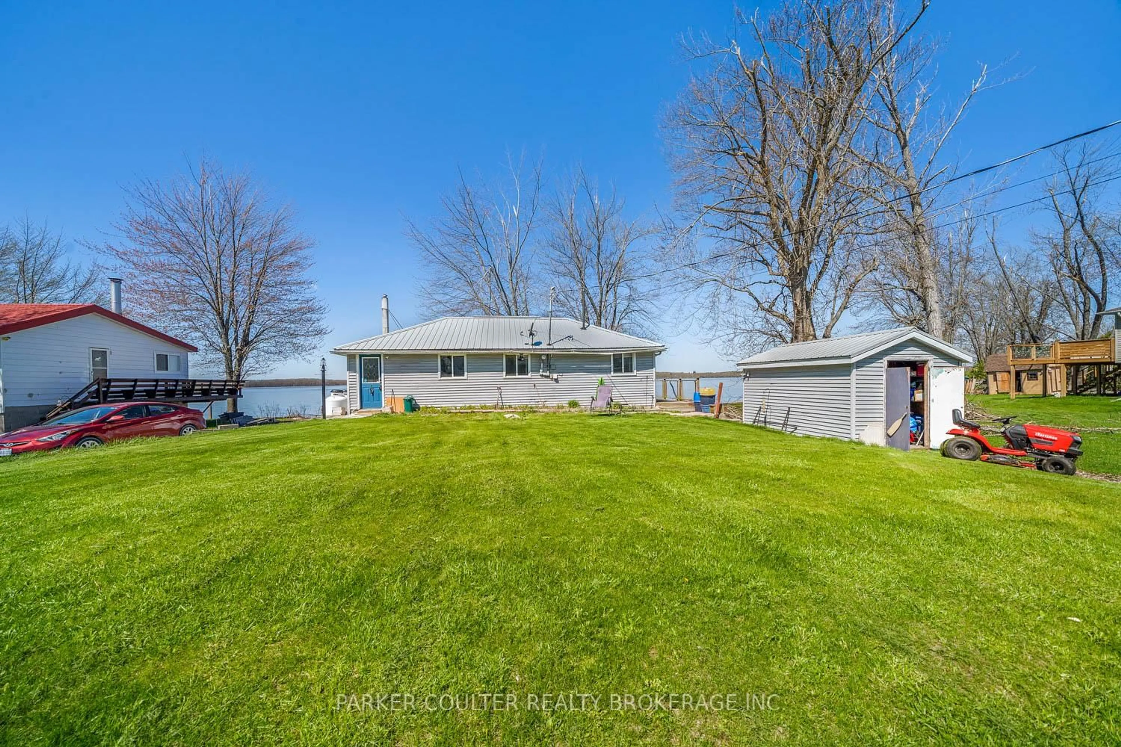 A pic from outside/outdoor area/front of a property/back of a property/a pic from drone, water/lake/river/ocean view for 6222 Bluebird St, Ramara Ontario L3V 0K6