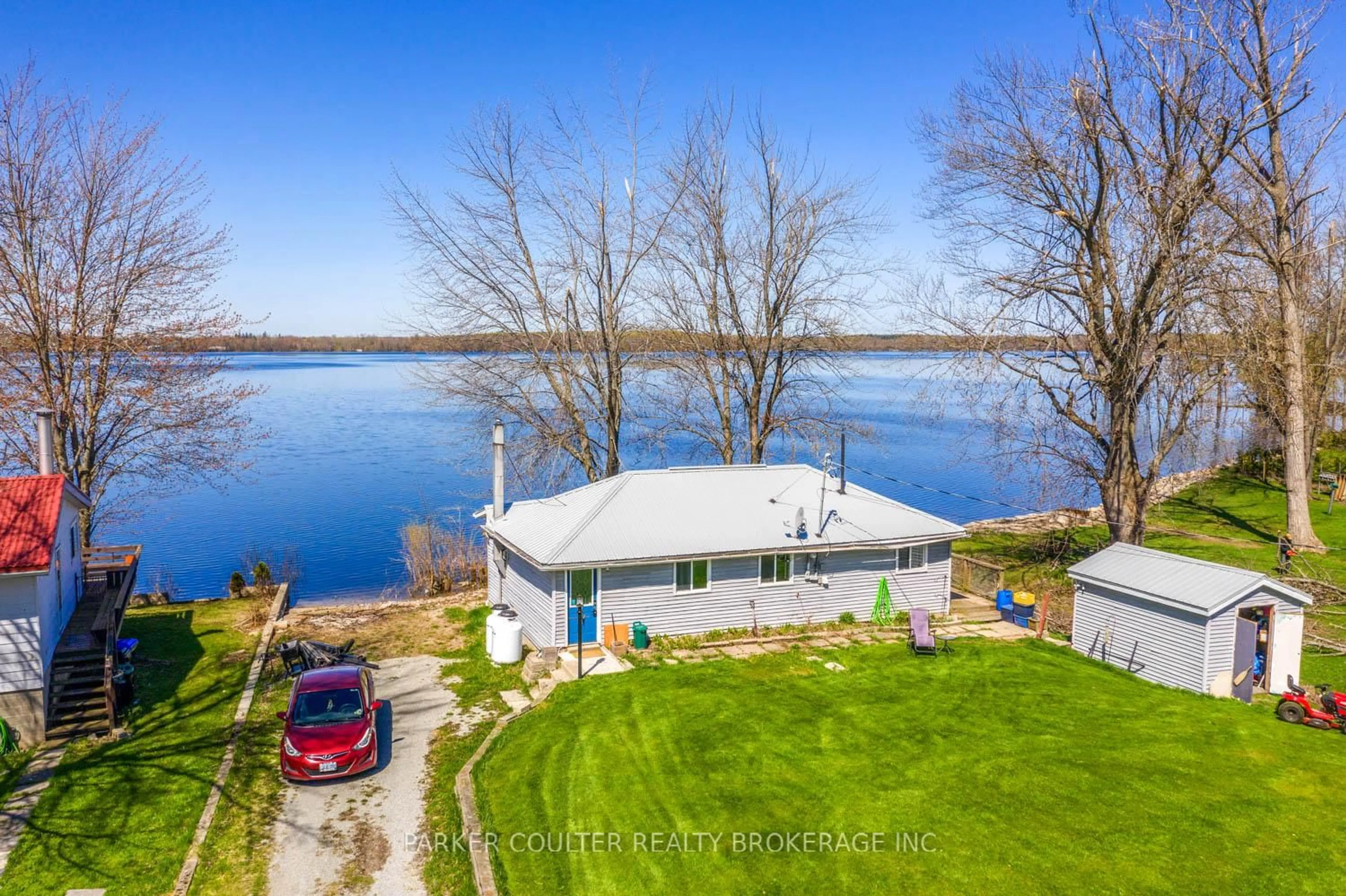 A pic from outside/outdoor area/front of a property/back of a property/a pic from drone, water/lake/river/ocean view for 6222 Bluebird St, Ramara Ontario L3V 0K6