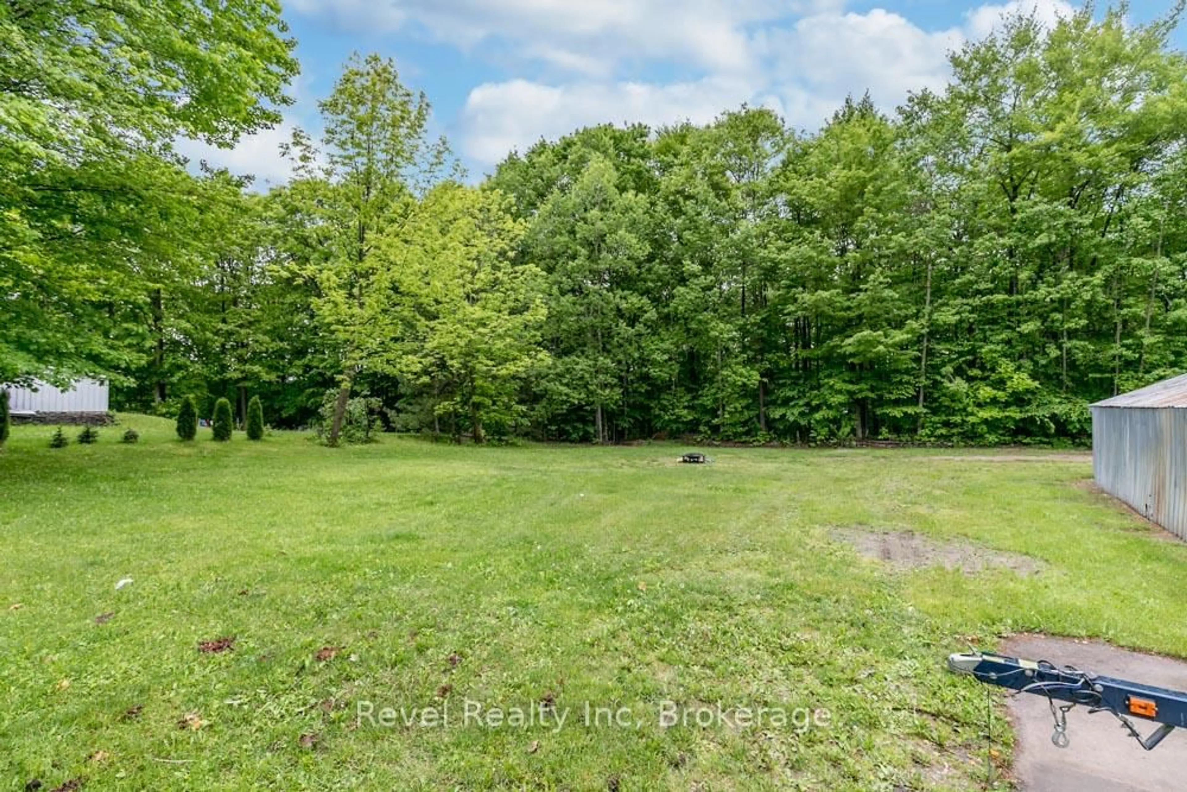 A pic from outside/outdoor area/front of a property/back of a property/a pic from drone, forest/trees view for 1710 GOLF LINK Rd, Tiny Ontario L0L 2J0