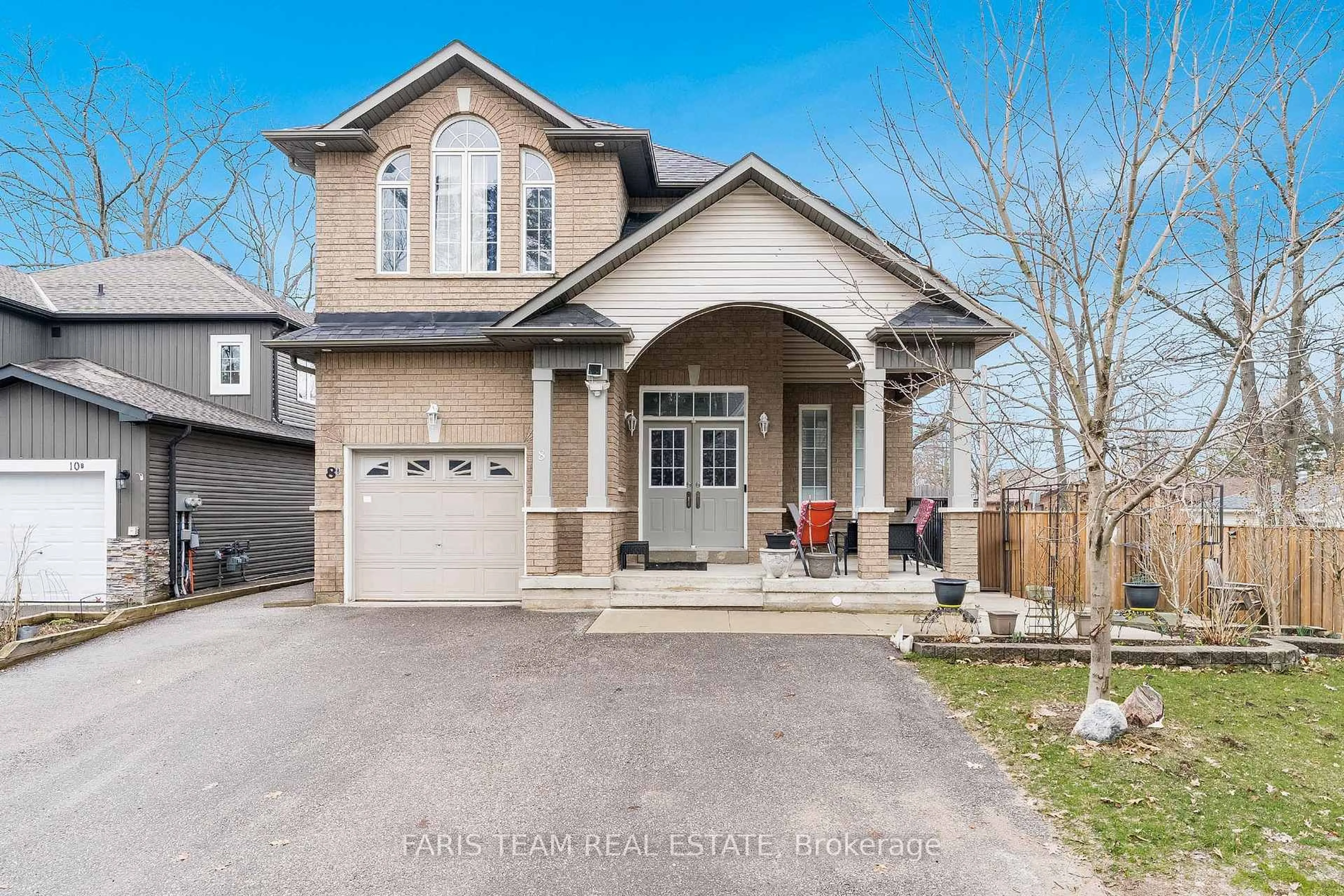 Home with brick exterior material, street for 8 Elm Dr, Wasaga Beach Ontario L9Z 2L3